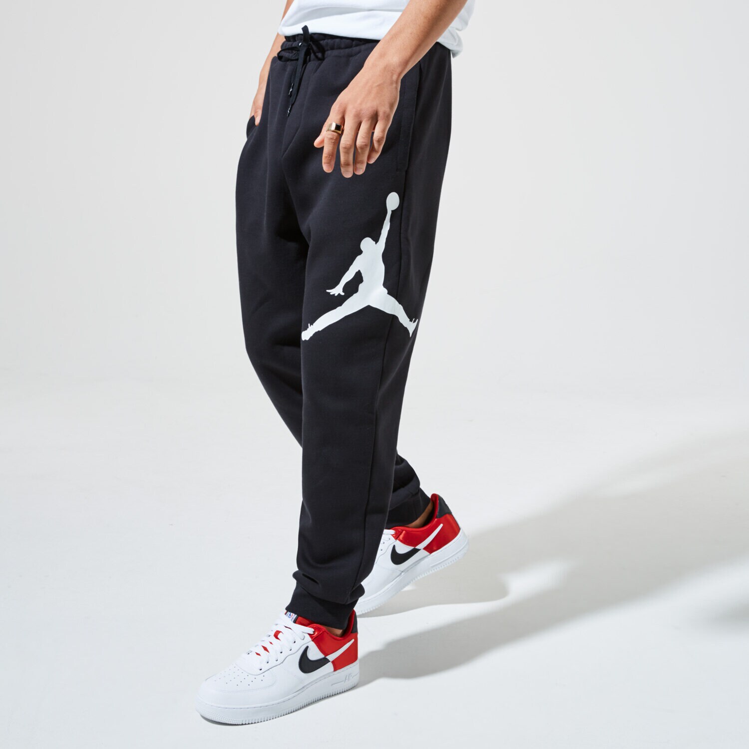 Spodnie sportowe męskie JORDAN SPODNIE M J JUMPMAN LOGO FLC PANT BQ8646-010 CZARNY