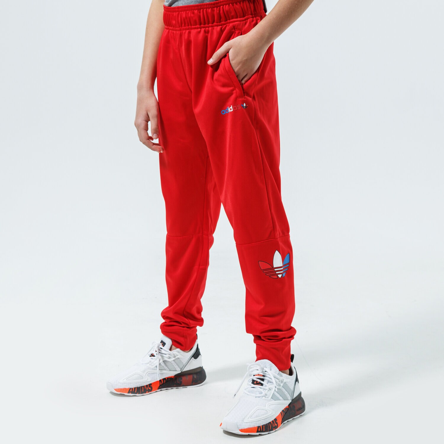 Sportowe spodnie dziecięce ADIDAS SPODNIE TRACKPANT MM GN7445 CZERWONY