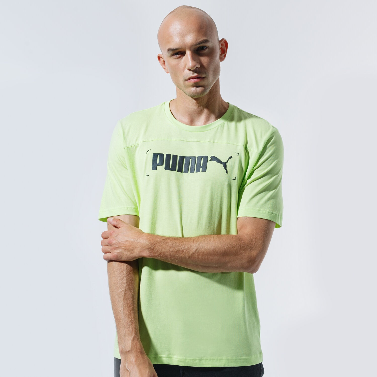 Koszulka, t-shirt sportowy męski PUMA T-SHIRT NU-TILITY GRAPHIC TEE 58348734 ZIELONY