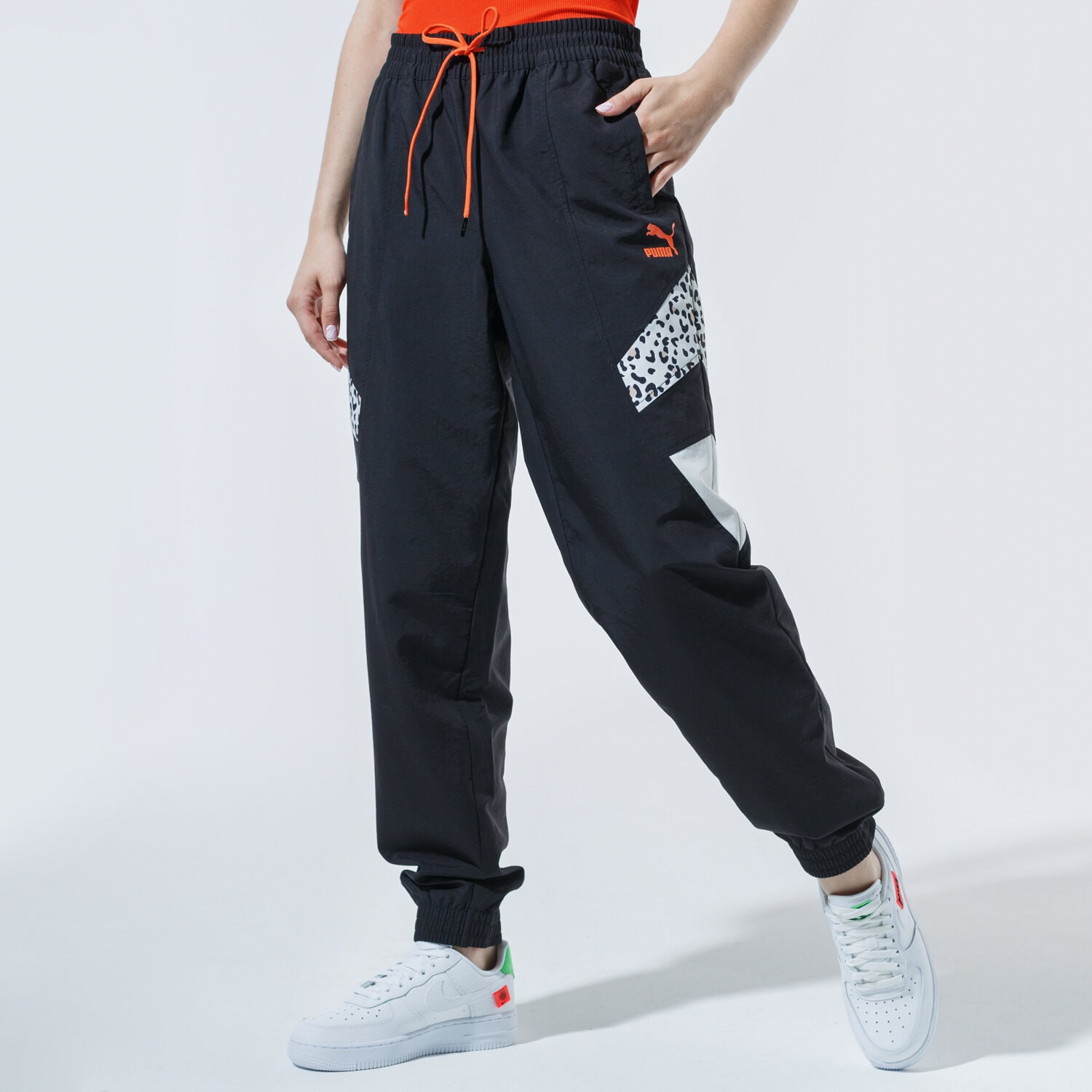 Spodnie sportowe damskie PUMA SPODNIE TFS TRACK PANTS 59776101 CZARNY