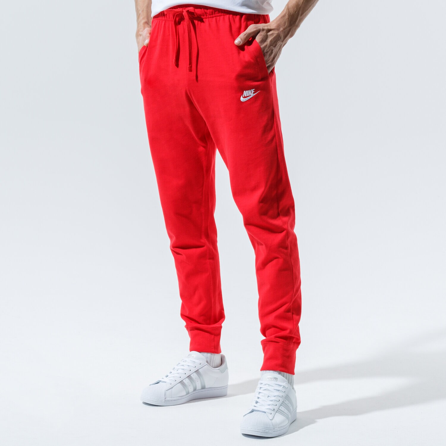 Spodnie sportowe męskie NIKE SPODNIE M NSW CLUB JGGR JSY BV2762-657 CZERWONY