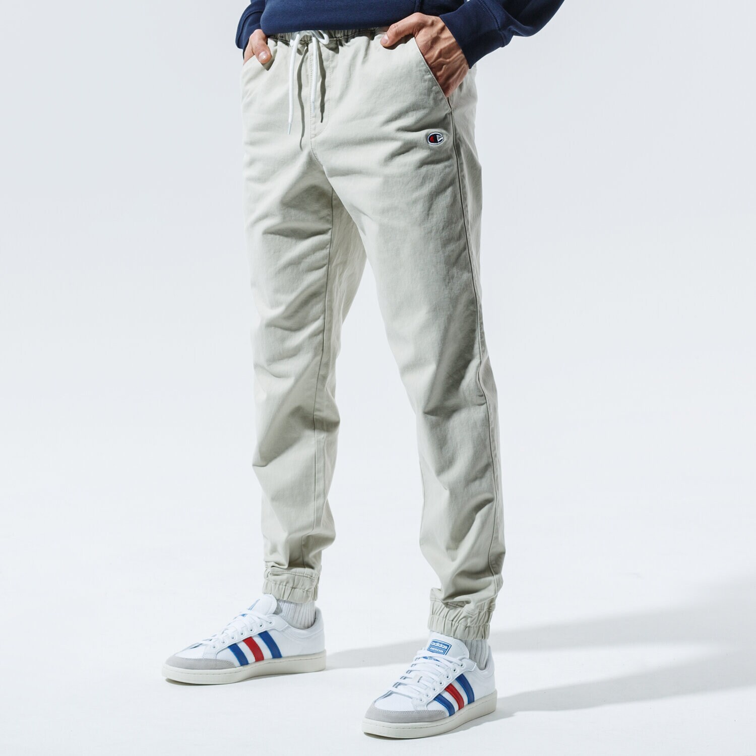 Spodnie sportowe męskie CHAMPION SPODNIE ELASTIC CUFF PANTS 215193MS022 BEŻOWY