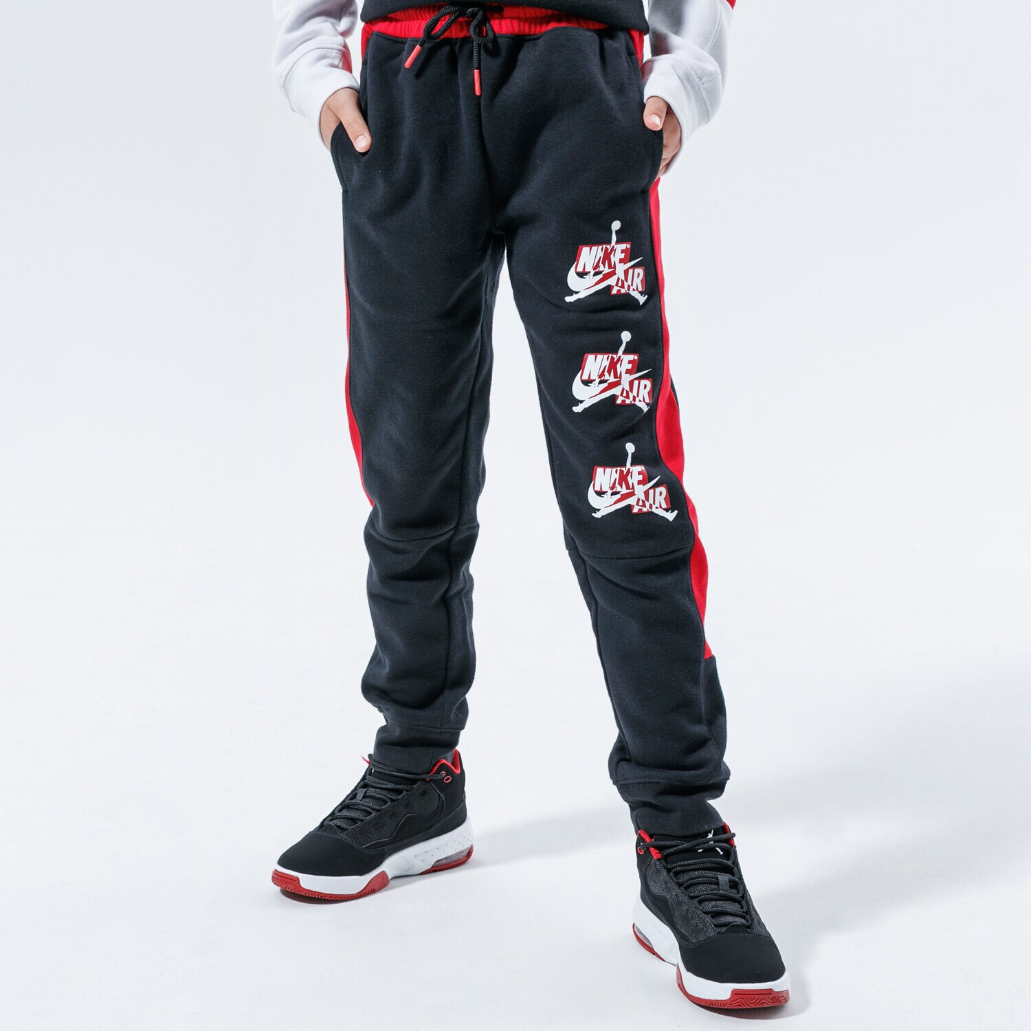 Sportowe spodnie dziecięce JORDAN SPODNIE JUMPMAN CLASSICS III FLEECE PANT 957529-023 CZARNY