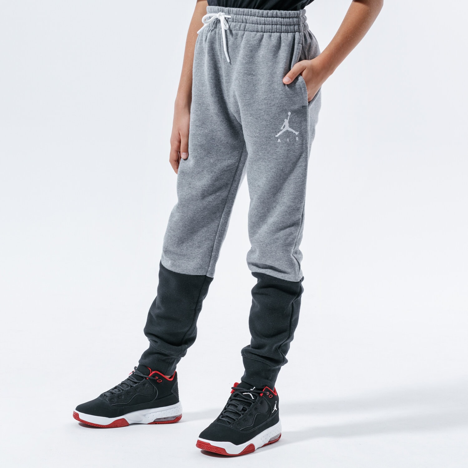 Sportowe spodnie dziecięce JORDAN SPODNIE JUMPMAN AIR FLEECE PANT BOY 957725-K6N SZARY