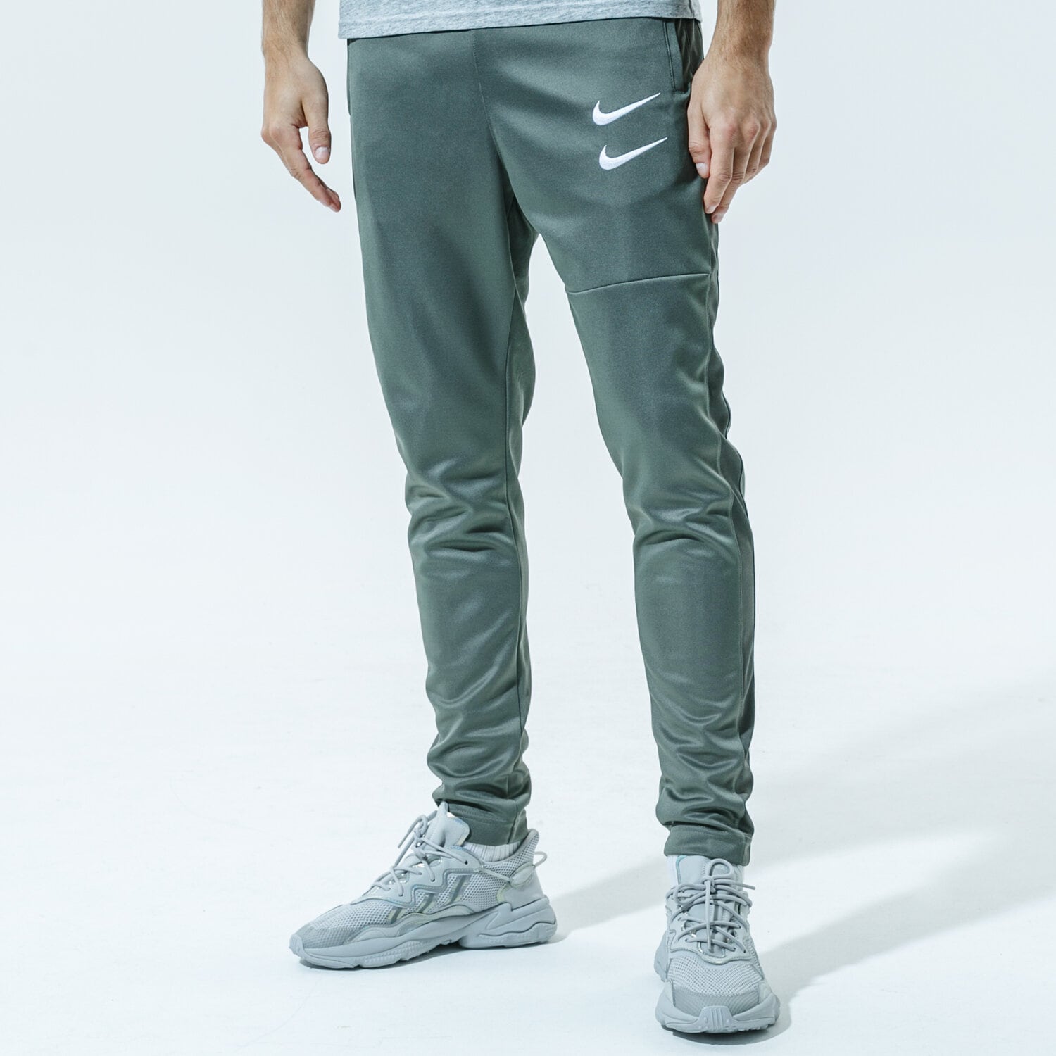Spodnie sportowe męskie NIKE SPODNIE M NSW SWOOSH PANT PK CU3898-380 ZIELONY