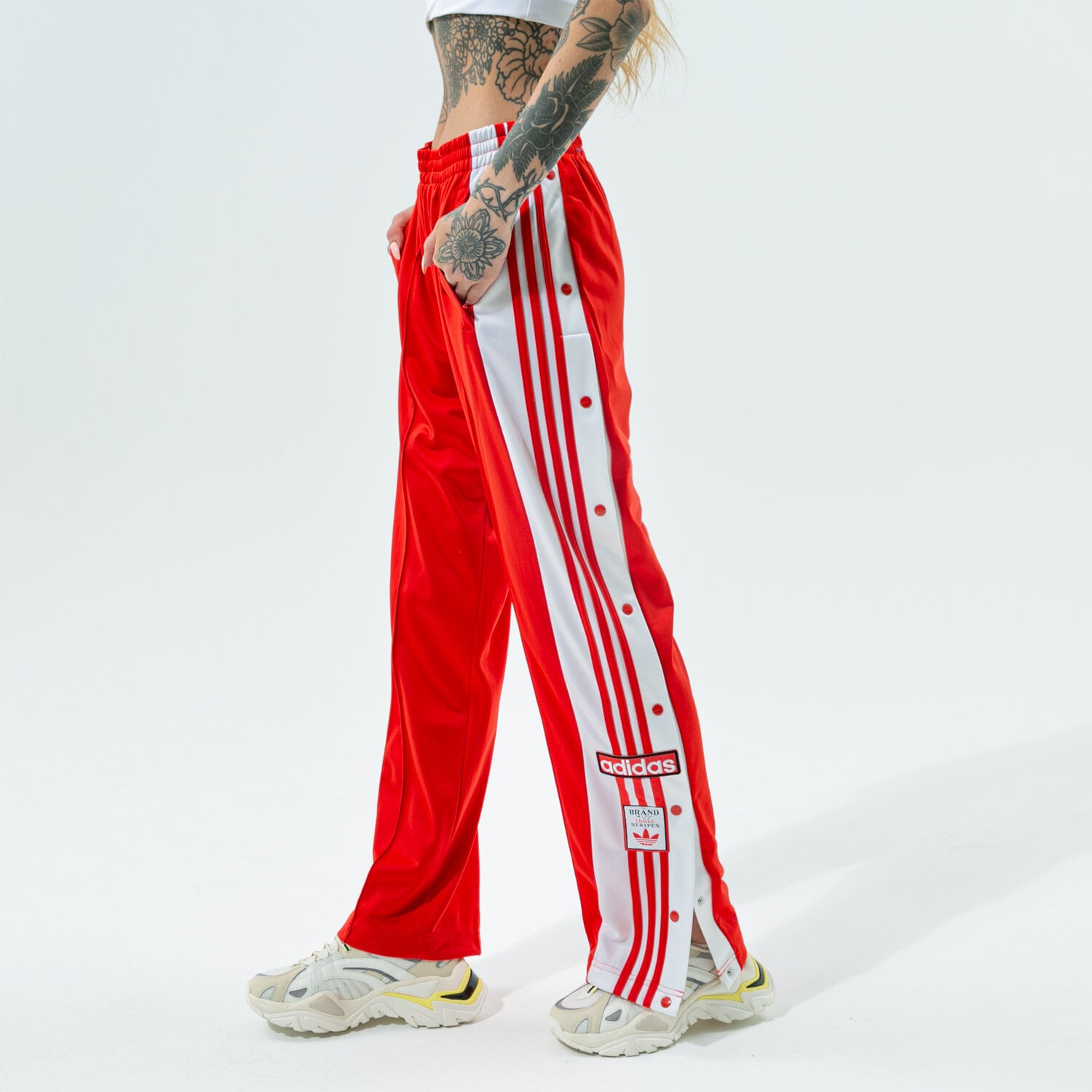 Spodnie sportowe damskie ADIDAS SPODNIE ADIBREAK TP H34672 CZERWONY