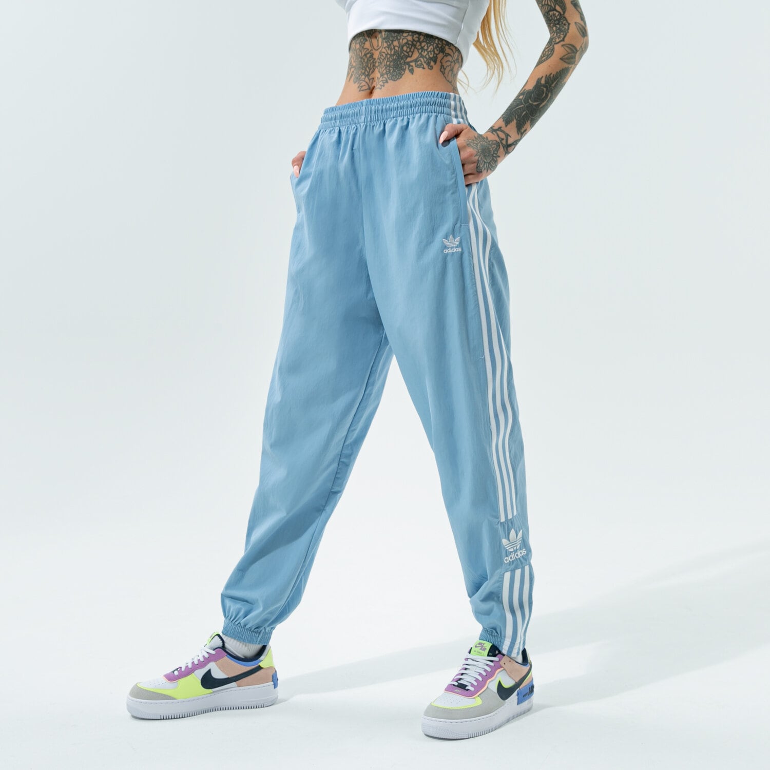Spodnie sportowe damskie ADIDAS SPODNIE TRACK PANTS H20548 NIEBIESKI