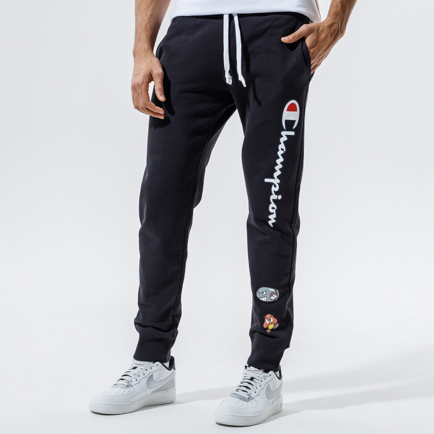Spodnie sportowe męskie CHAMPION SPODNIE RIB CUFF PANTS 216870KK001 CZARNY