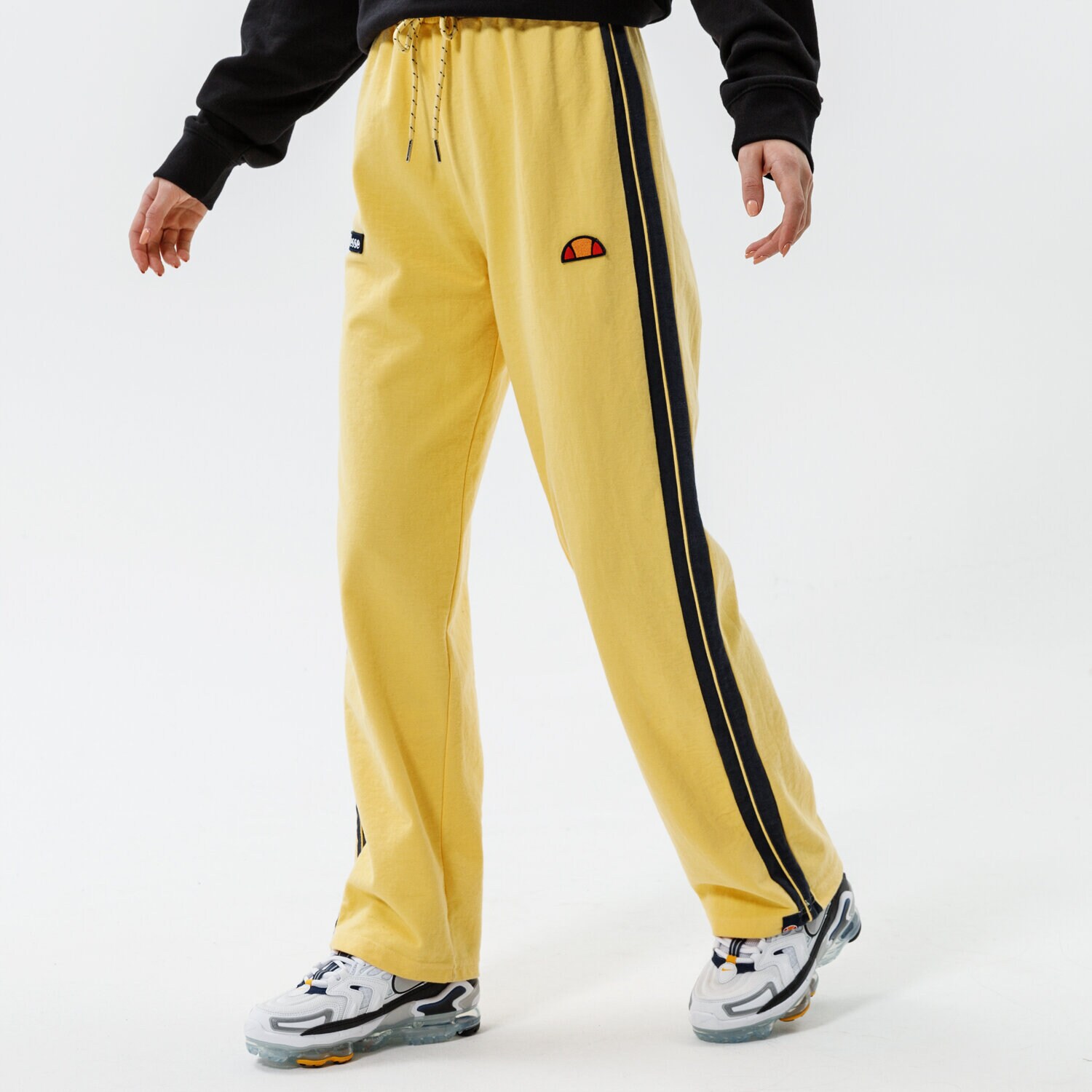 Spodnie sportowe damskie ELLESSE SPODNIE ATER TRACK PANT YELLOW SGK12166606 ŻÓŁTY