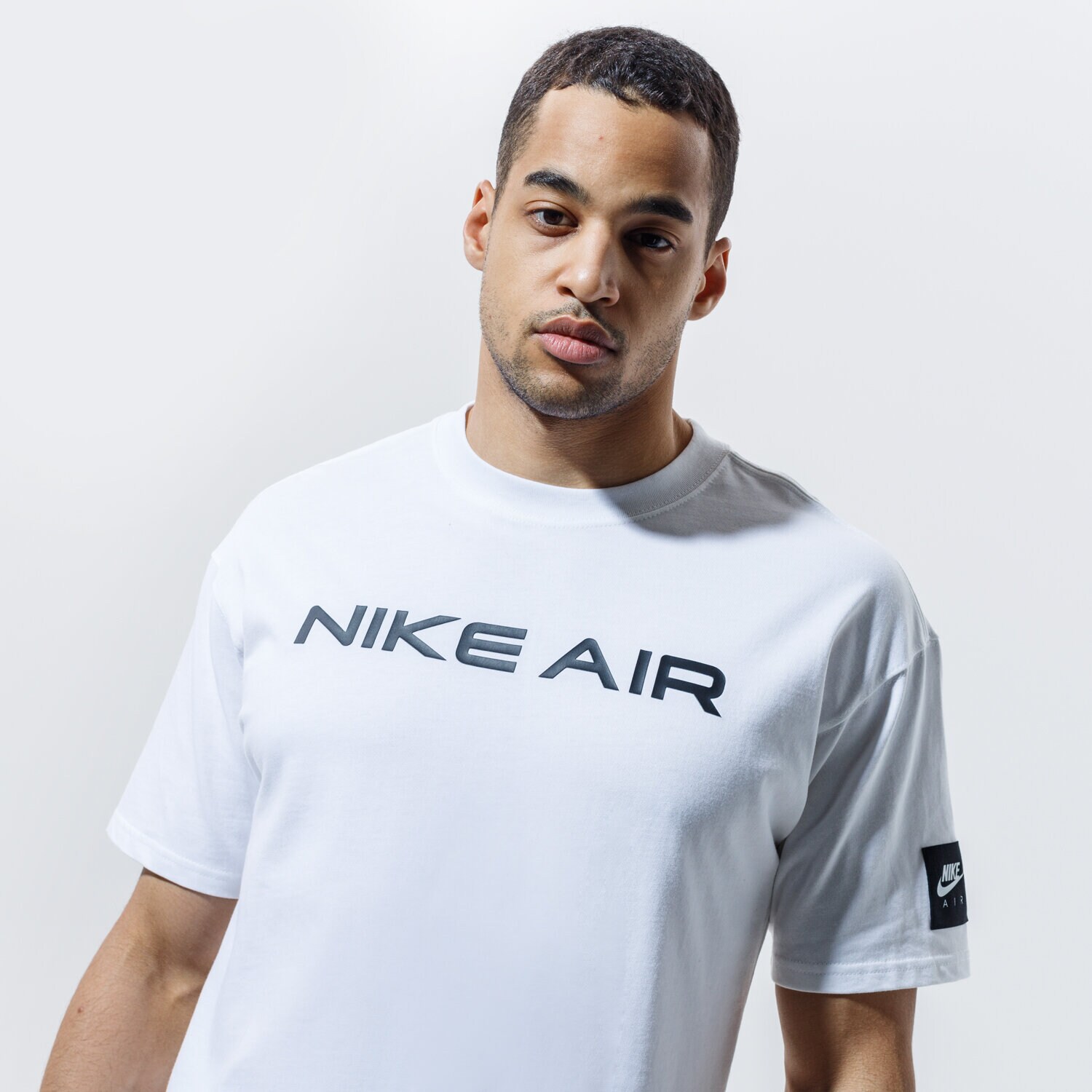 Koszulka, t-shirt sportowy męski NIKE T-SHIRT AIR DA0304-100 BIAŁY