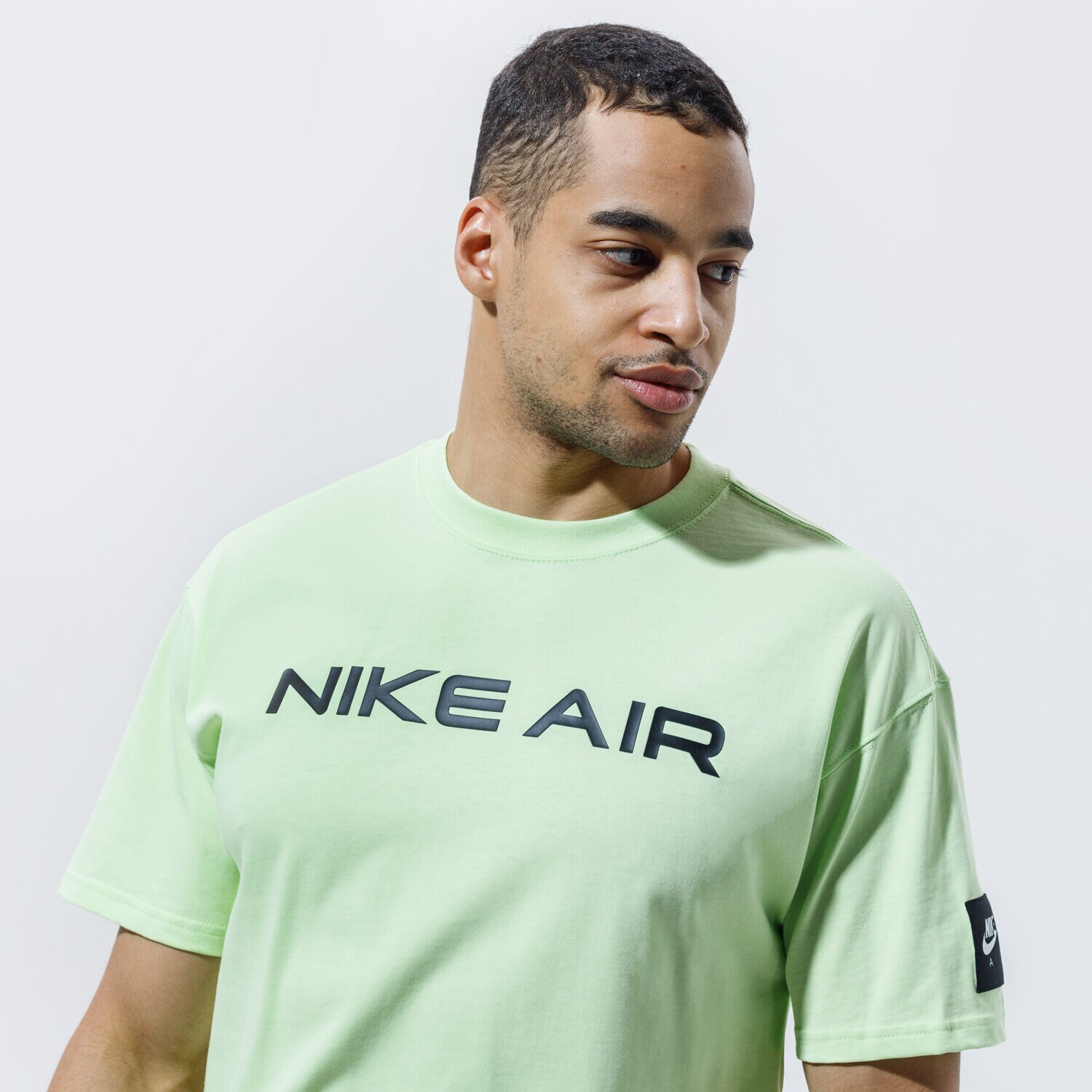 Koszulka, t-shirt sportowy męski NIKE T-SHIRT AIR DA0304-383 ZIELONY