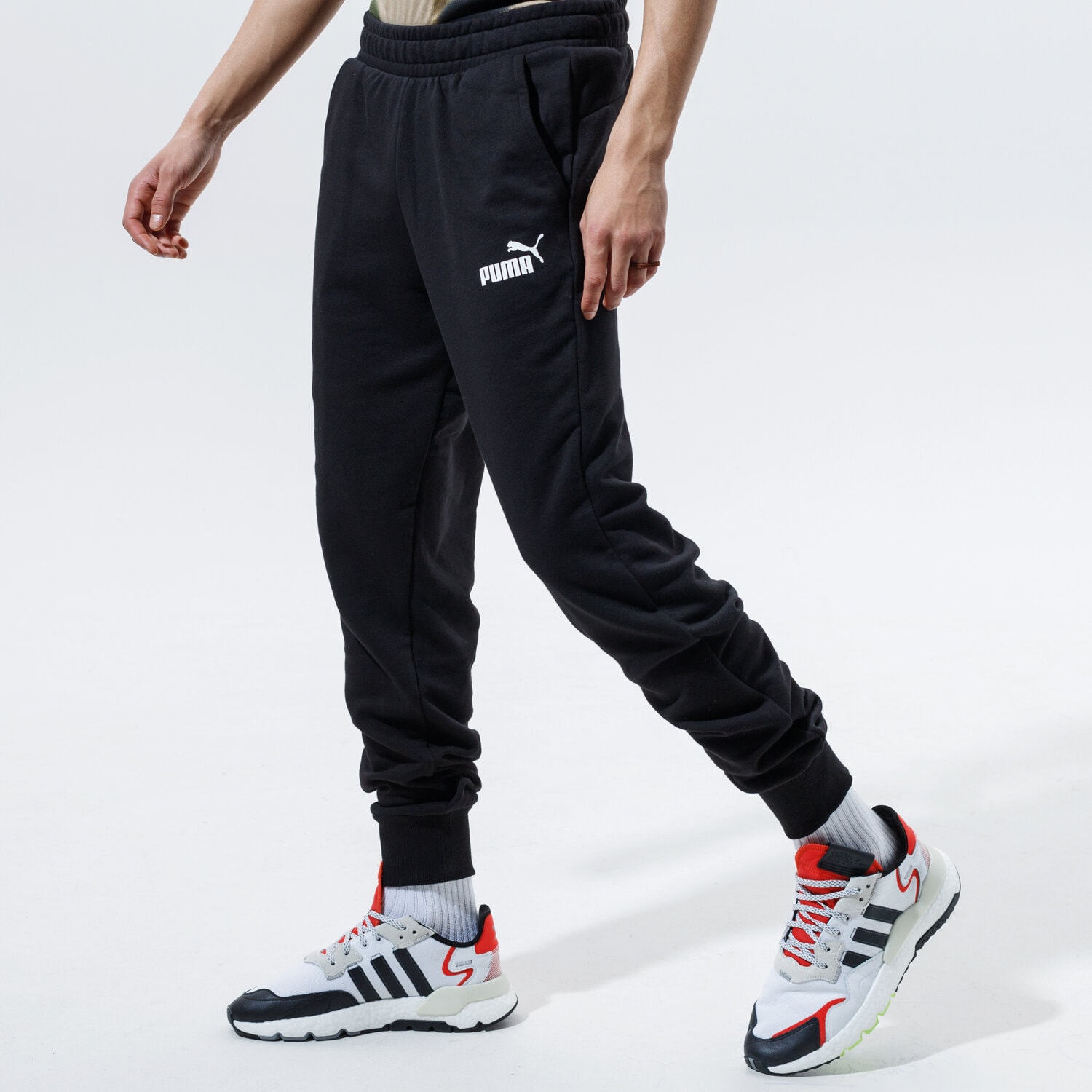 Spodnie sportowe męskie PUMA SPODNIE ESS LOGO TR CL 58671601 CZARNY