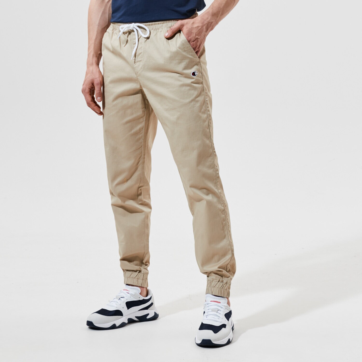 Spodnie sportowe męskie CHAMPION SPODNIE ELASTIC CUFF PANTS 214366MS025 BEŻOWY