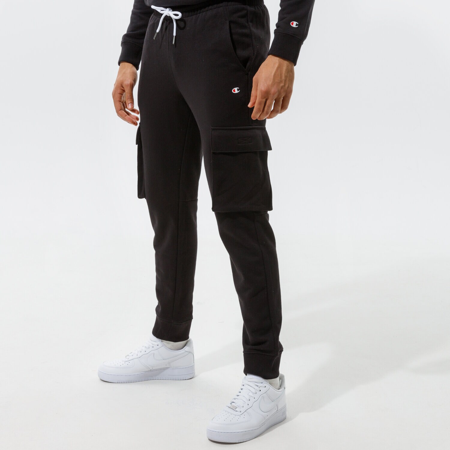 Spodnie sportowe męskie CHAMPION SPODNIE RIB CUFF PANTS 216017KK001 CZARNY