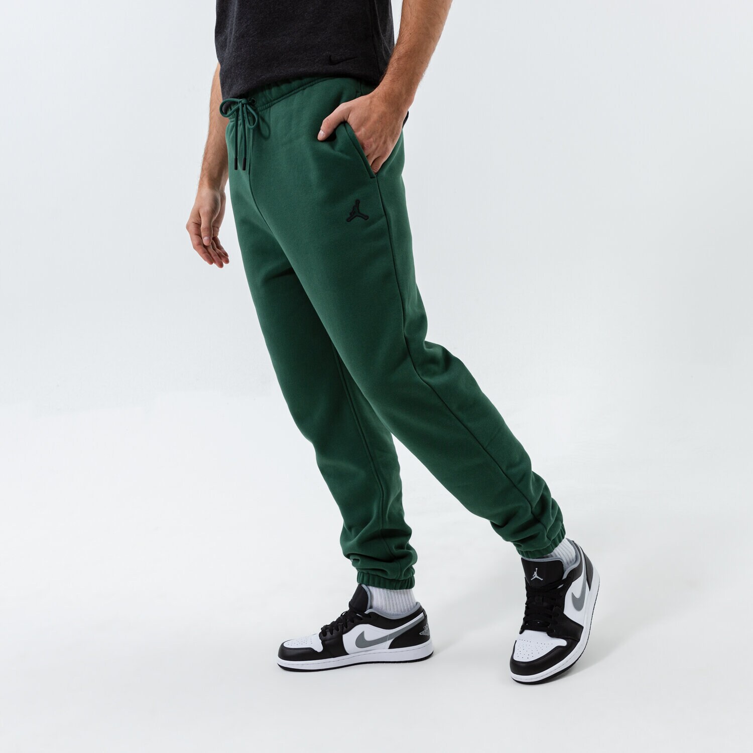 Spodnie sportowe męskie JORDAN SPODNIE M J ESS FLC PANT DA9820-333 ZIELONY
