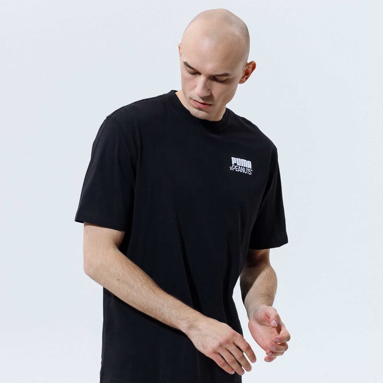 Koszulka, t-shirt sportowy męski PUMA T-SHIRT PUMA X PEANUTS TEE 53061601 CZARNY