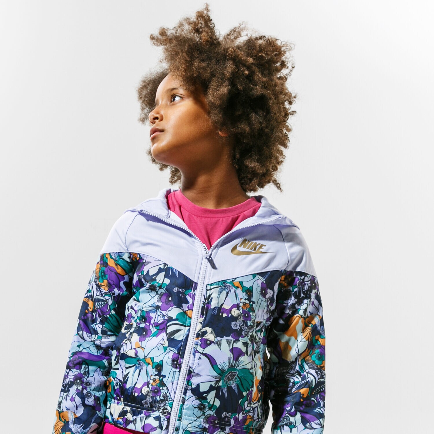 Dziecięca kurtka przejściowa (wiosenna/jesienna) NIKE KURTKA G NSW WR AOP JKT ENERGY DC7095-572 MULTICOLOR