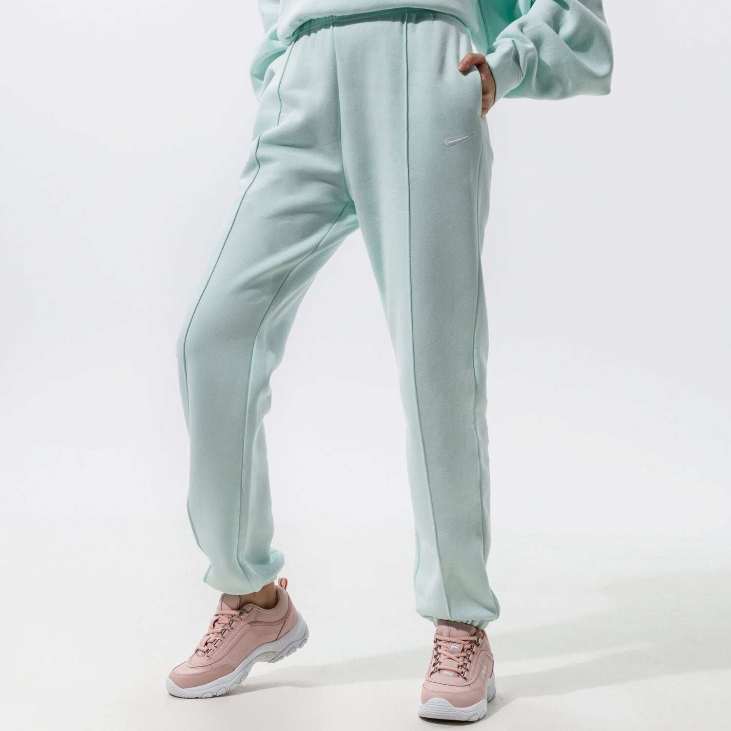 Spodnie sportowe damskie NIKE SPODNIE SPORTSWEAR ESSENTIAL BV4089-394 NIEBIESKI