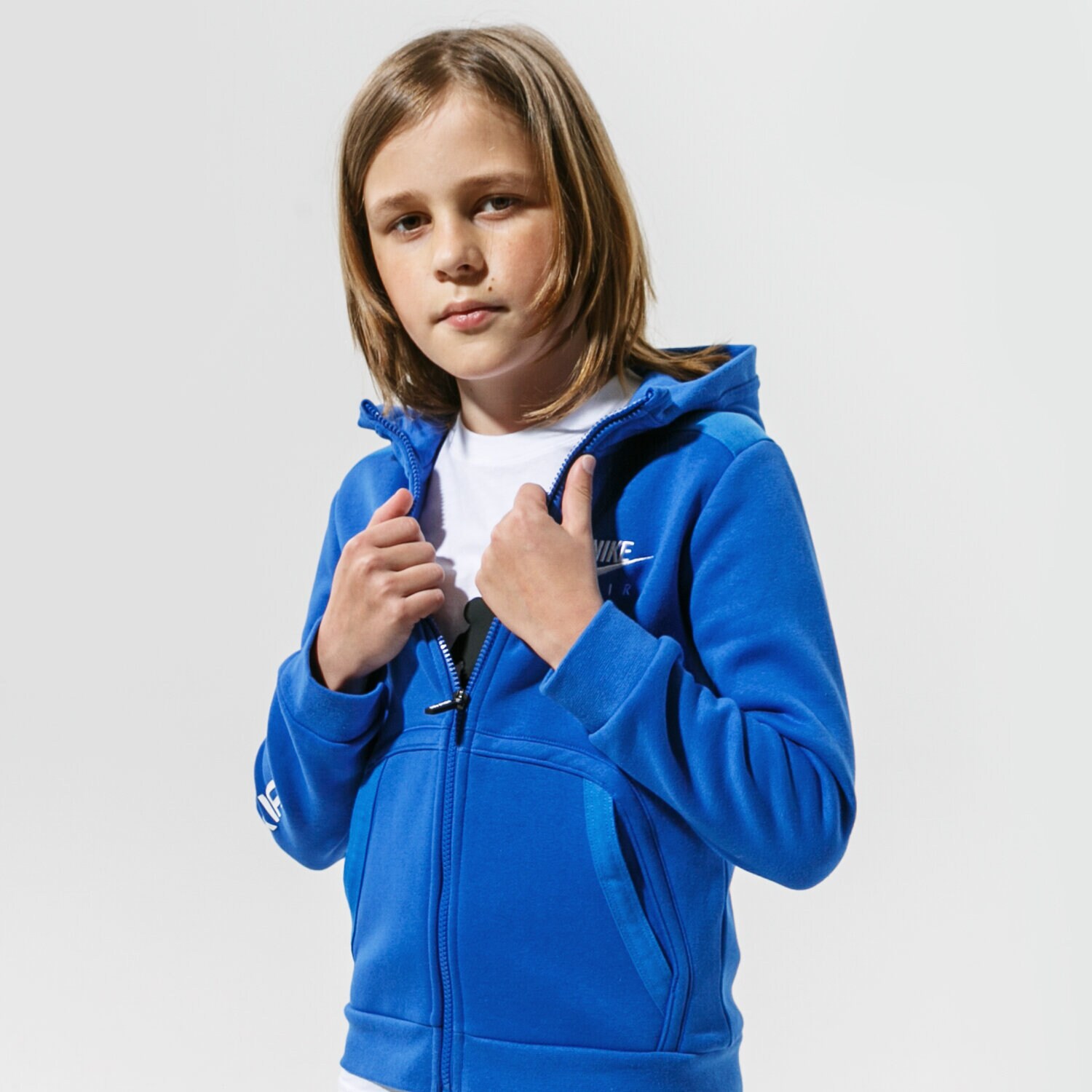 Sportowa bluza dziecięca NIKE BLUZA ROZPINANA Z KAPTUREM AIR DA0699-480 NIEBIESKI
