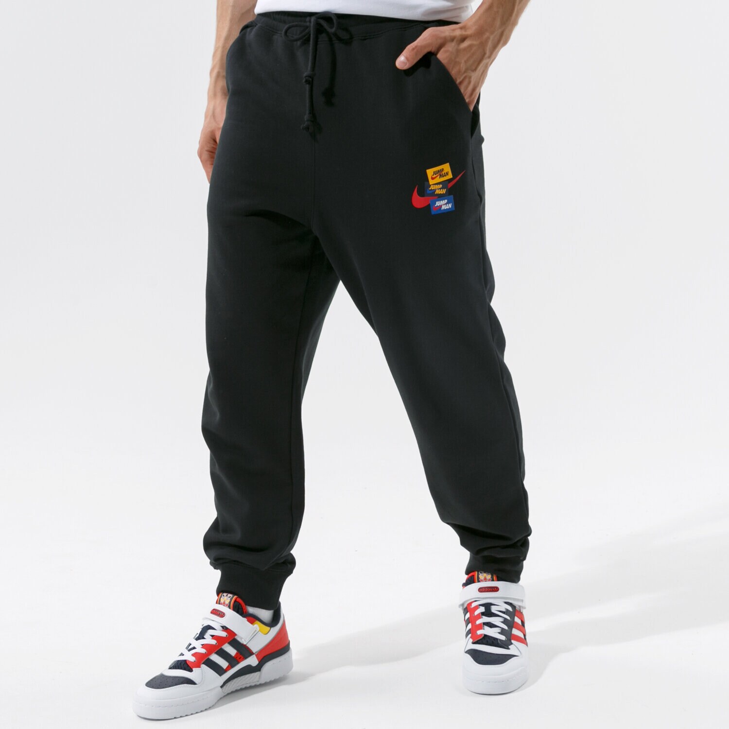 Spodnie sportowe męskie JORDAN SPODNIE M J JMPMN FLC PANT DH7724-010 CZARNY