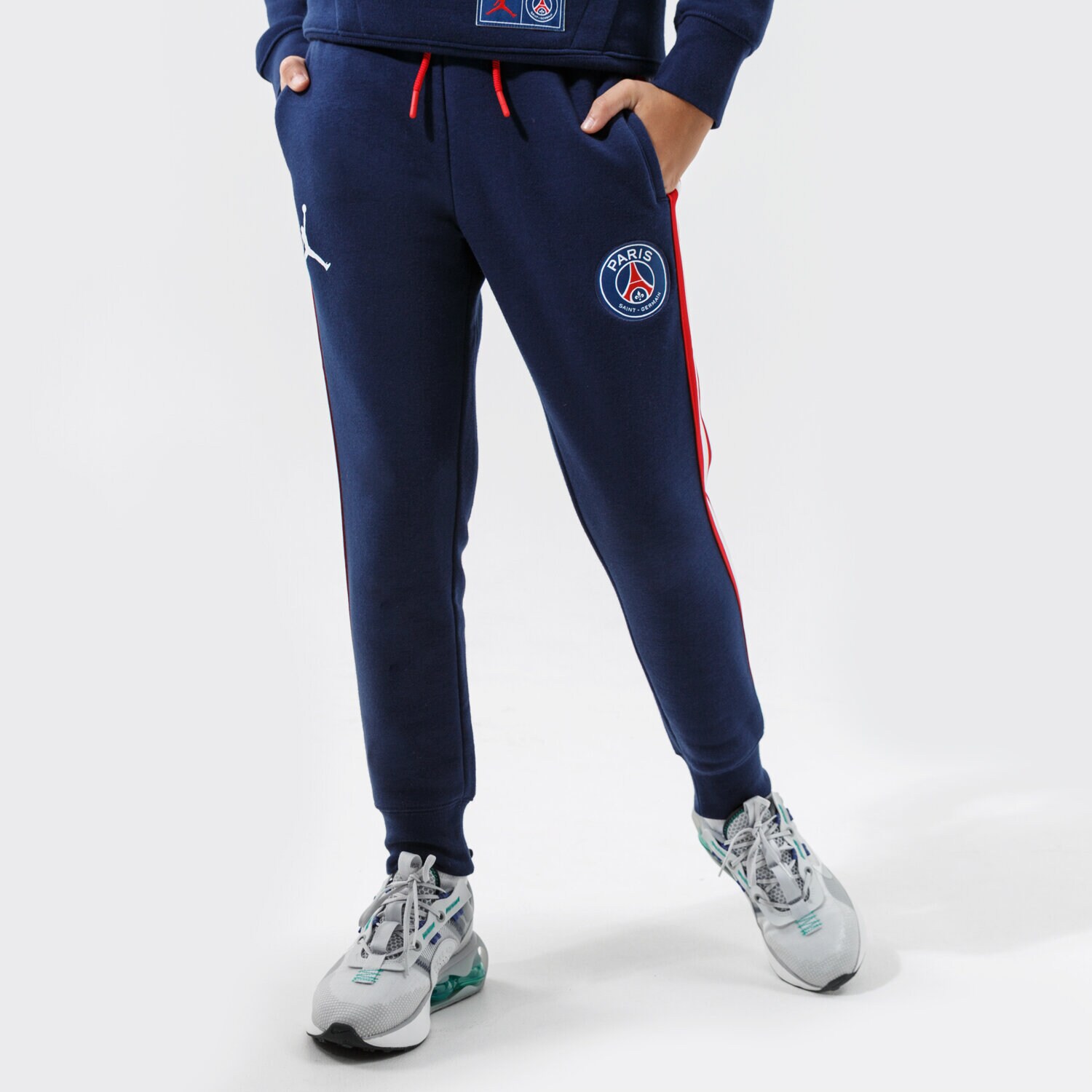 Sportowe spodnie dziecięce JORDAN SPODNIE PARIS SAINT-GERMAIN FLC PANT GIRL 95A726-U90 GRANATOWY