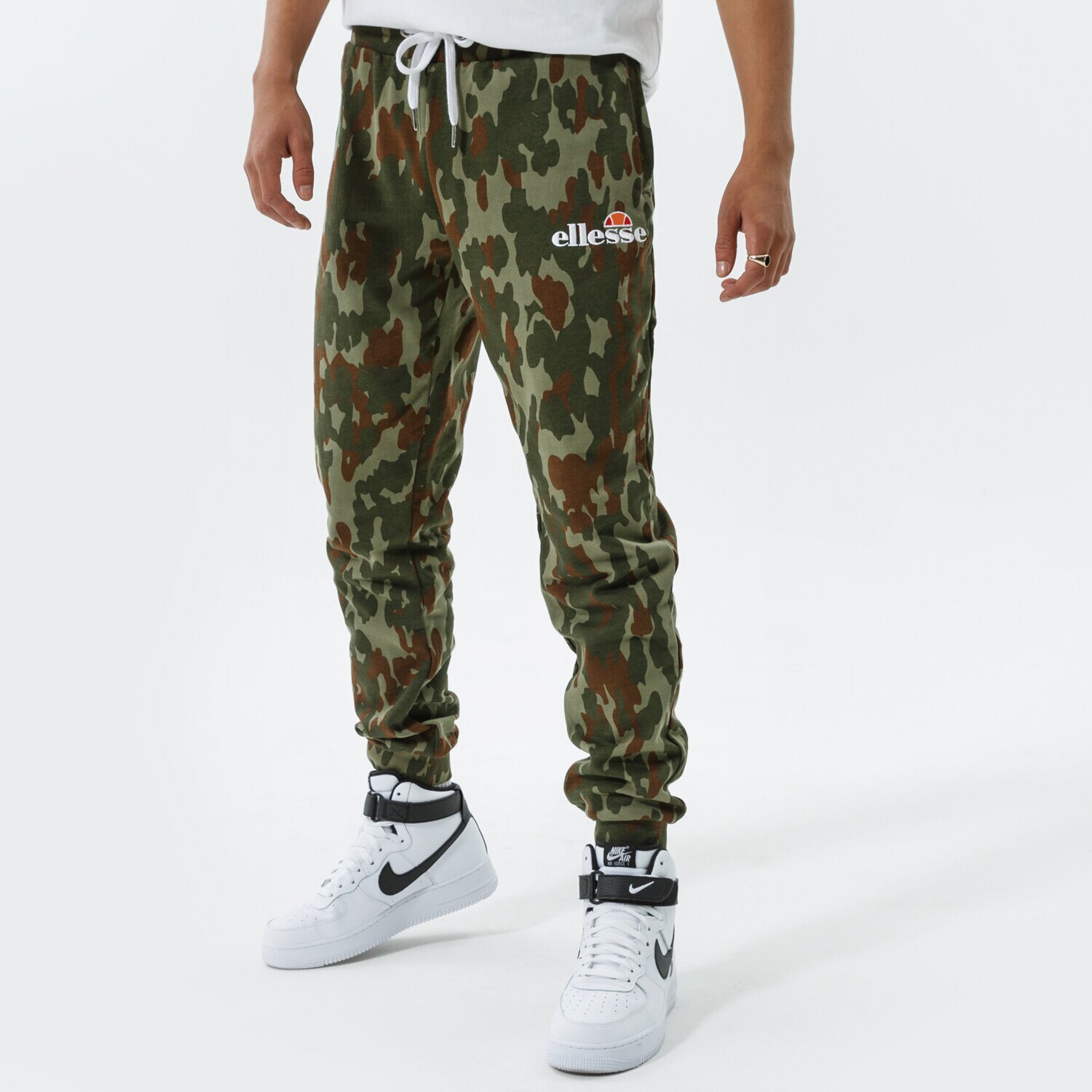 Spodnie sportowe męskie ELLESSE SPODNIE NIORO CAMO JOG PANT KHA SHK12436506 POMARAŃCZOWY