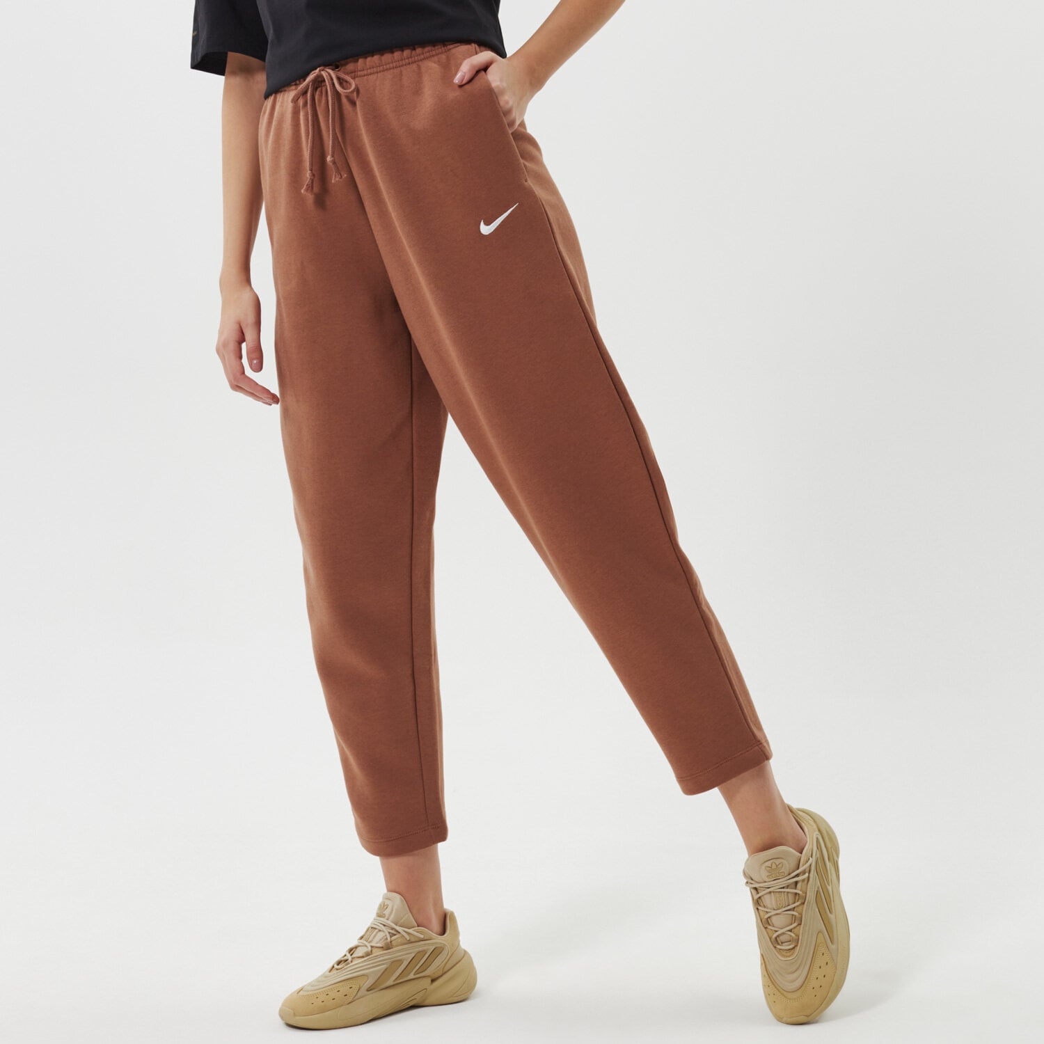 Spodnie sportowe damskie NIKE SPODNIE W NSW ESSNTL FLC MR PNT CLCTN DD5636-256 BEŻOWY