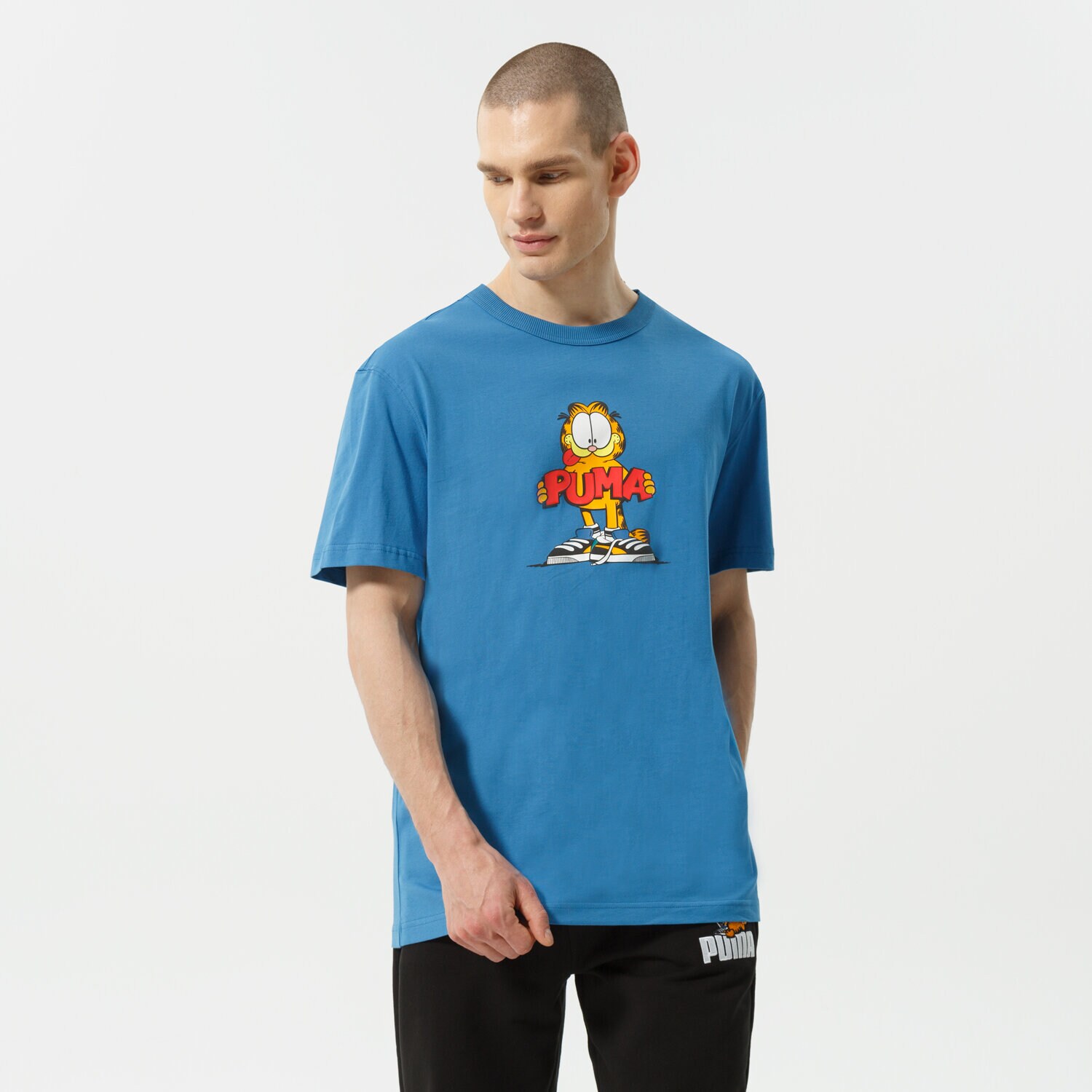Koszulka, t-shirt sportowy męski PUMA T-SHIRT PUMA X GARFIELD GRAPHIC TEE 534433 48 NIEBIESKI