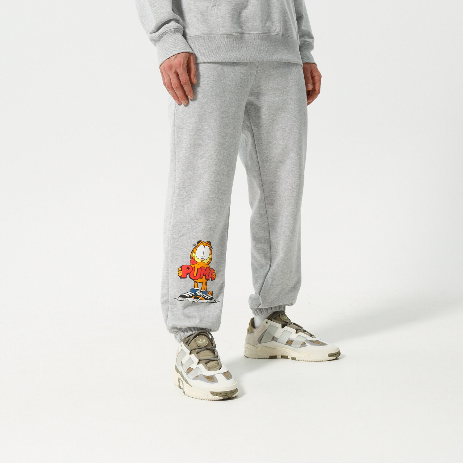 Spodnie sportowe męskie PUMA SPODNIE PUMA X GARFIELD SWEATPANTS 534436 04 SZARY