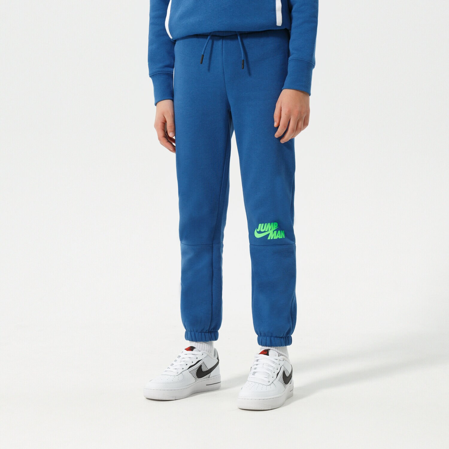Sportowe spodnie dziecięce JORDAN SPODNIE JUMPMAN X NIKE FLC PANT BOY 95B134-BAJ NIEBIESKI