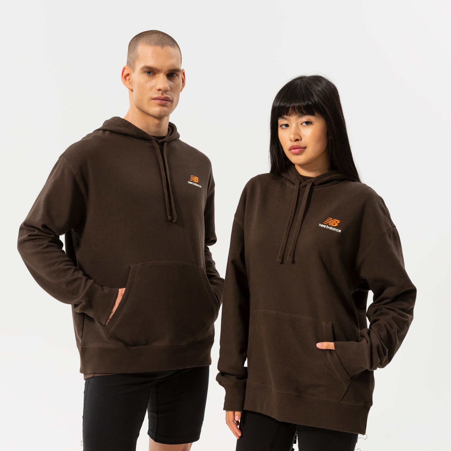 Bluza damska NEW BALANCE BLUZA Z KAPTUREM NB ESSENTIALS UNI-SSENTIALS PO  UT21500RHE BRĄZOWY