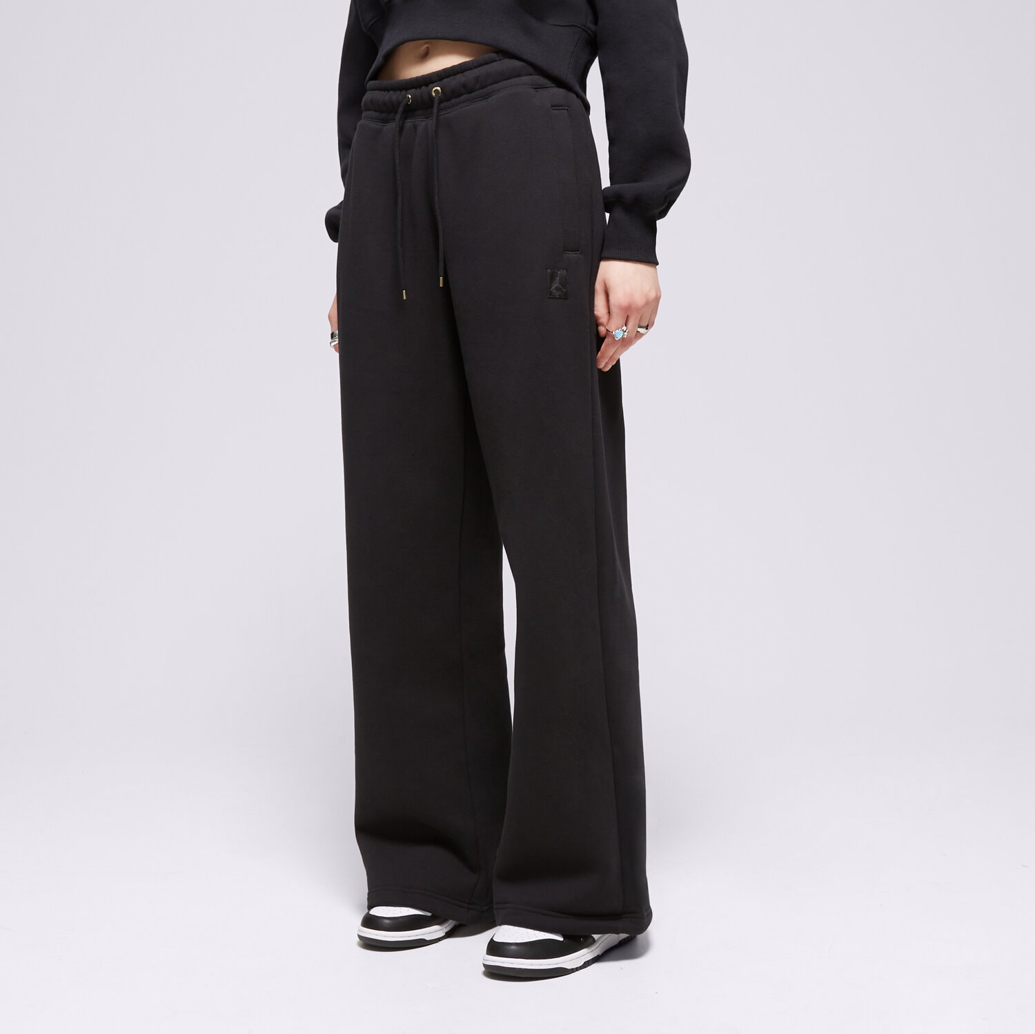 Spodnie sportowe damskie JORDAN SPODNIE W J FLT FLC PANT SSNL FD7224-010 CZARNY