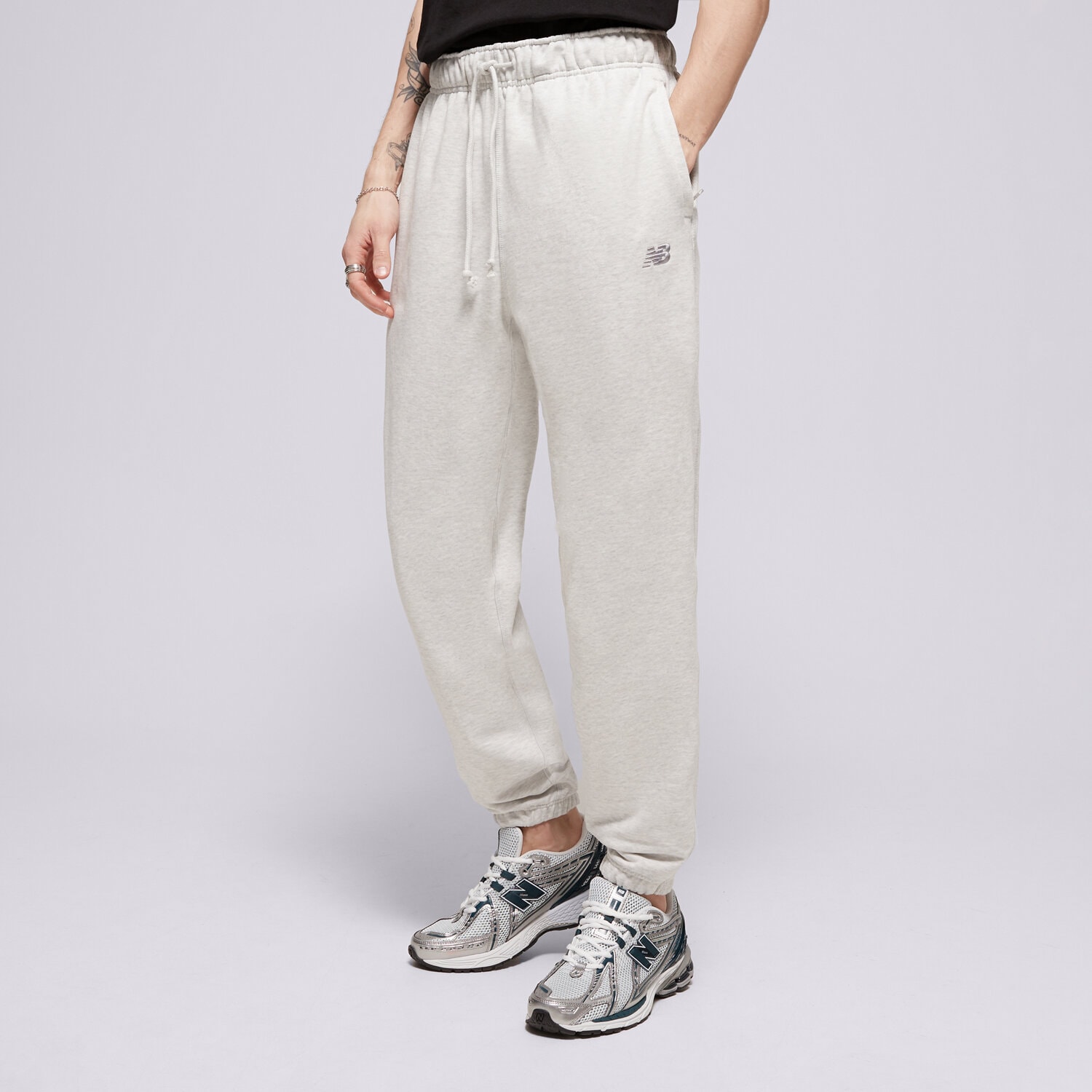 Spodnie sportowe męskie NEW BALANCE SPODNIE ATHLETICS FRENCH TERRY JOGGER MP41508AHH SZARY