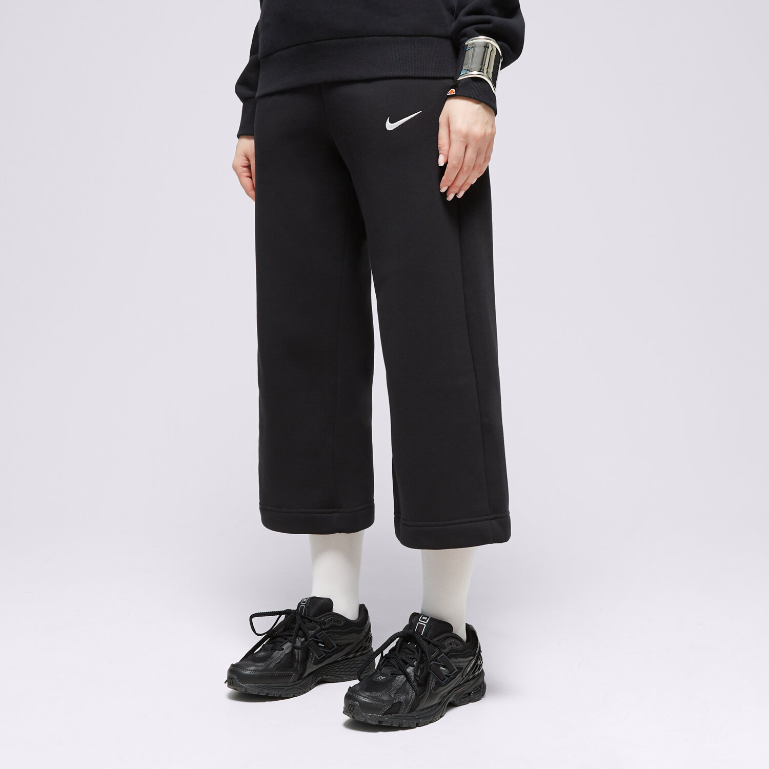 Spodnie sportowe damskie NIKE SPODNIE W NSW PHNX FLC HR CROP SWTP FB8313-010 CZARNY