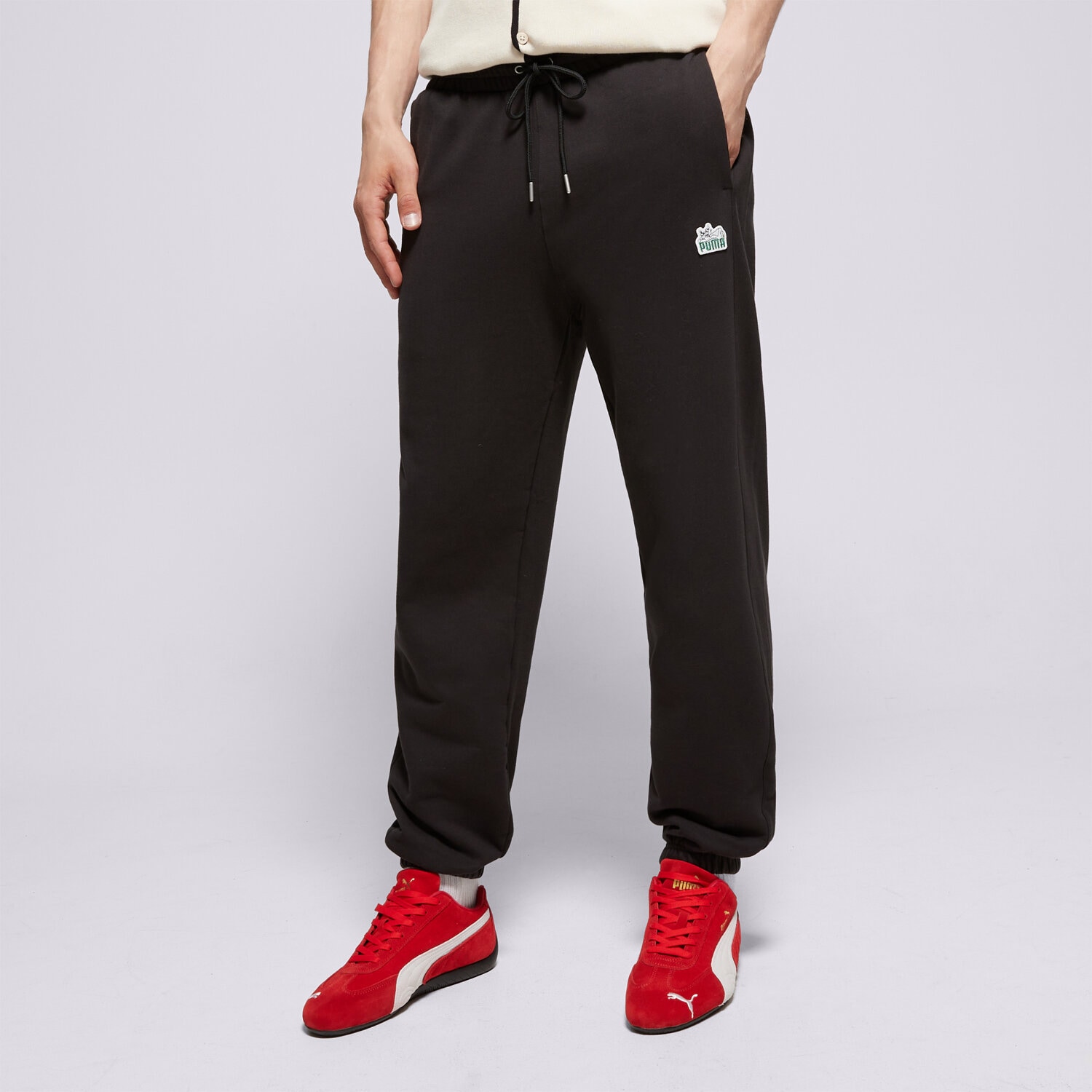 Spodnie sportowe męskie PUMA SPODNIE T7 FOR THE FANBASE SUPER 62503901 CZARNY