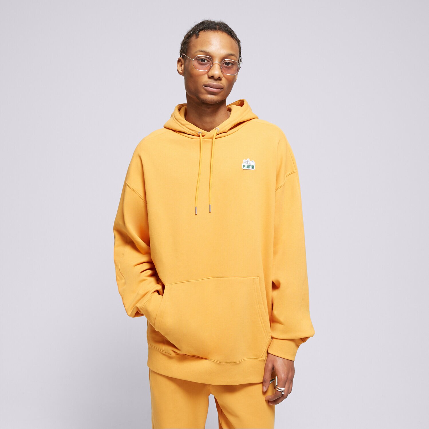 Bluza męska PUMA BLUZA Z KAPTUREM T7 FOR THE FANBASE SUPER 62503691 POMARAŃCZOWY