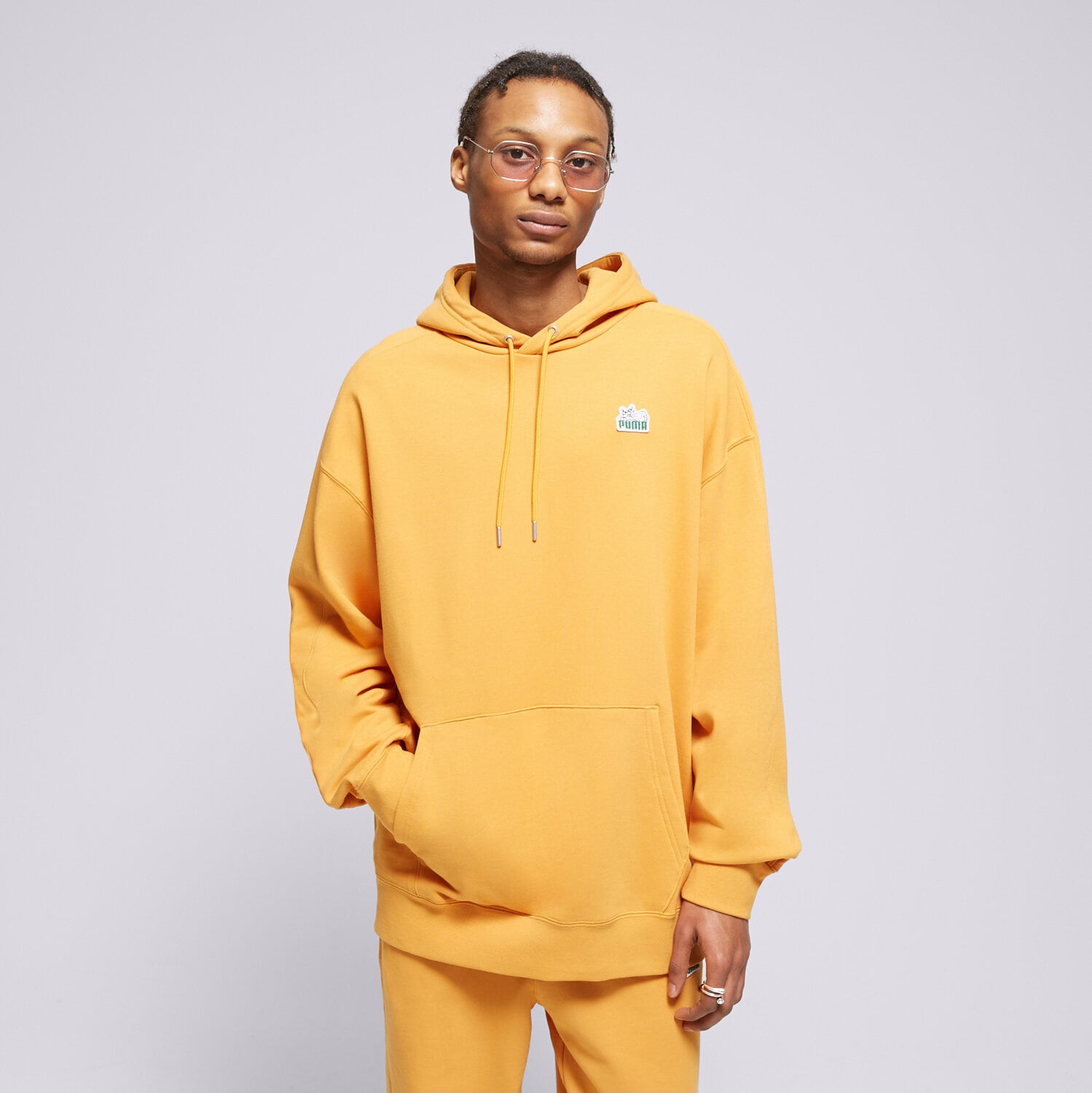 Bluza męska PUMA BLUZA Z KAPTUREM T7 FOR THE FANBASE SUPER 62503691 POMARAŃCZOWY