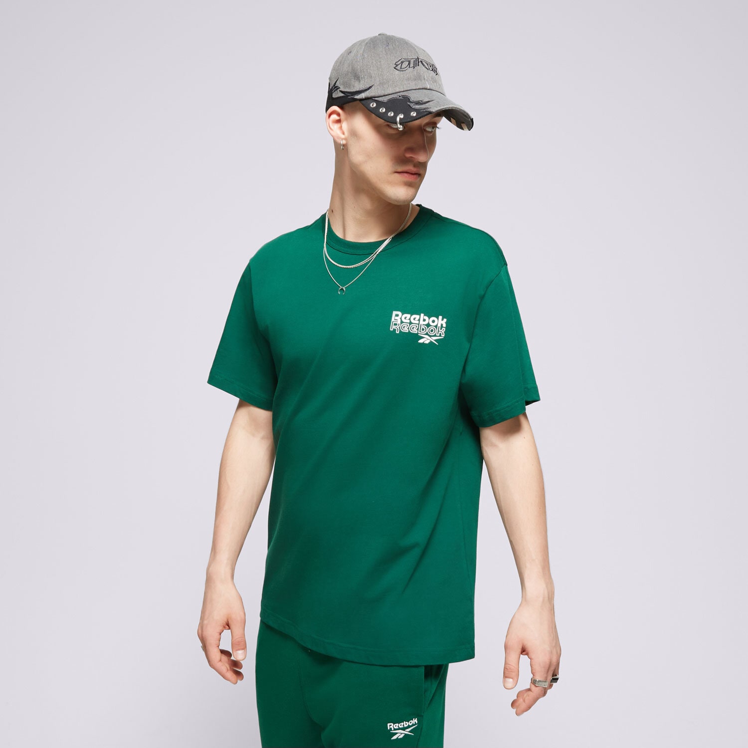Koszulka, t-shirt sportowy męski REEBOK T SHIRT RI PROP OF RBK GFX SS 100076384 ZIELONY