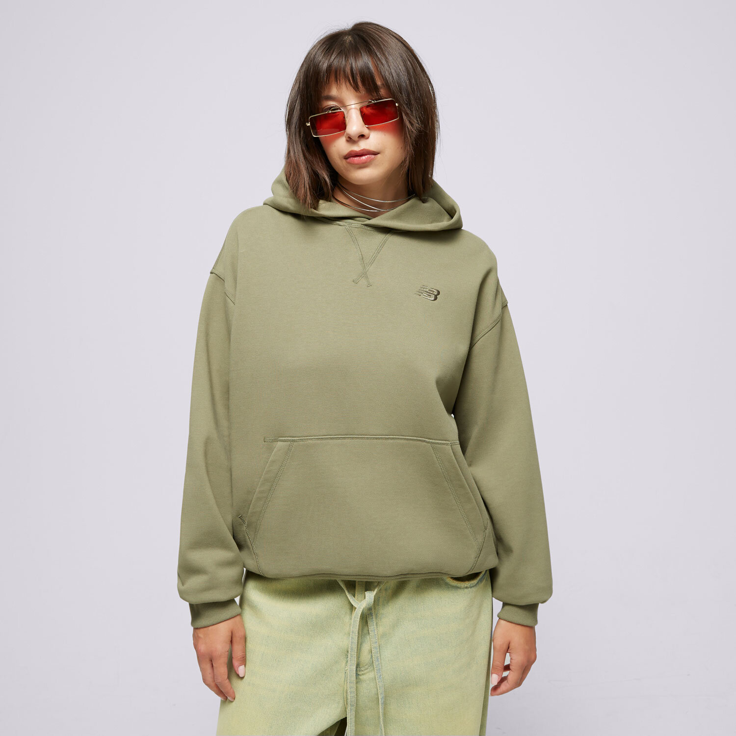 Bluza damska NEW BALANCE BLUZA Z KAPTUREM ATHLETICS FT WT41537DEK KHAKI