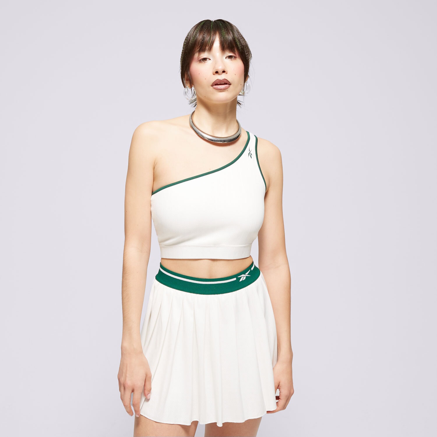 Koszulka, t-shirt damski REEBOK BRA CL Q2 CS ASYM BRALETTE 100075524 BIAŁY
