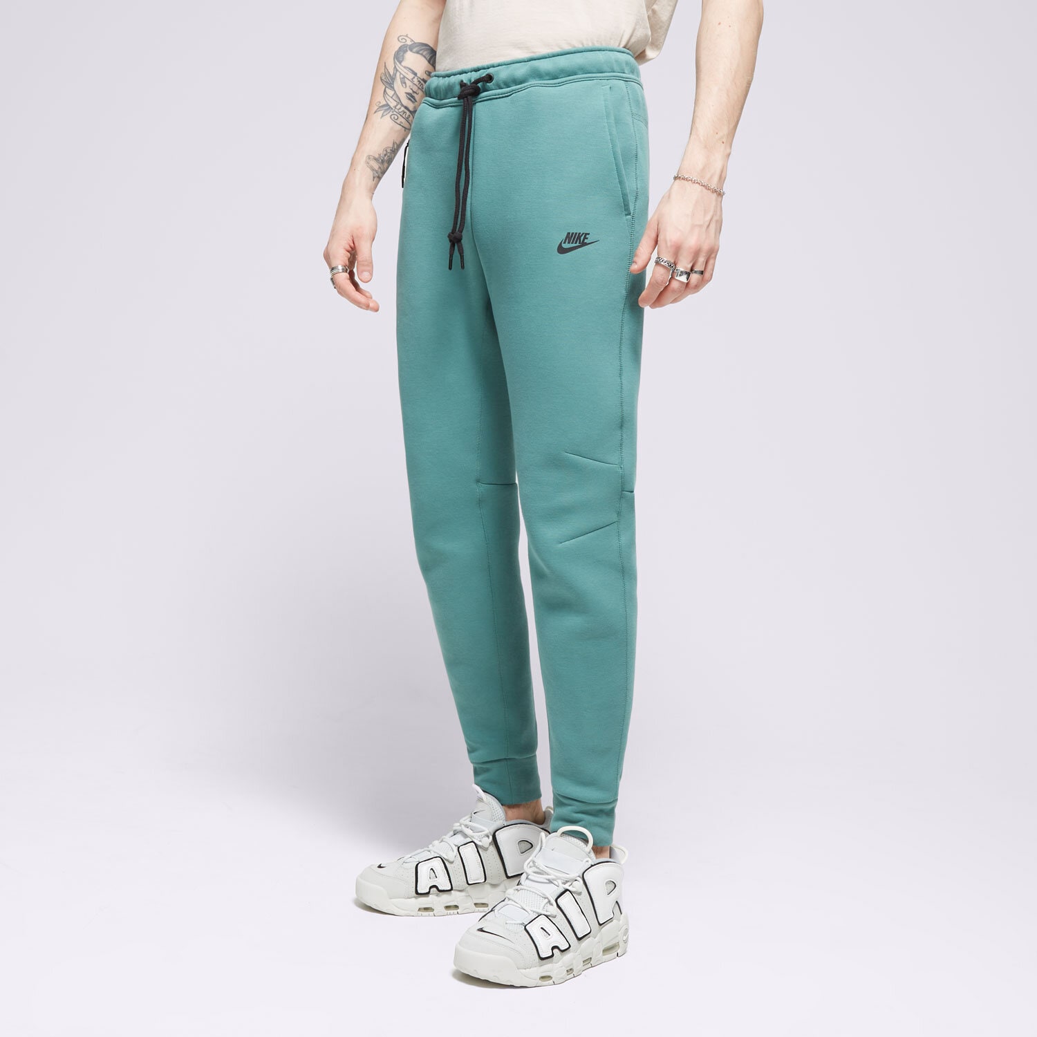 Spodnie sportowe męskie NIKE SPODNIE TECH FLEECE FB8002-361 ZIELONY