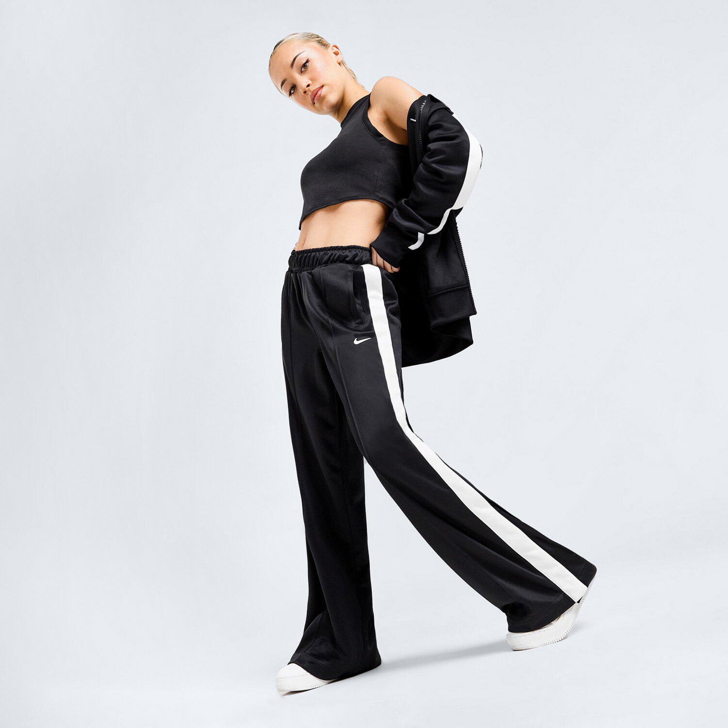 Spodnie sportowe damskie NIKE SPODNIE W NSW PK PANT SW STREETSWEAR FZ7279-010 CZARNY