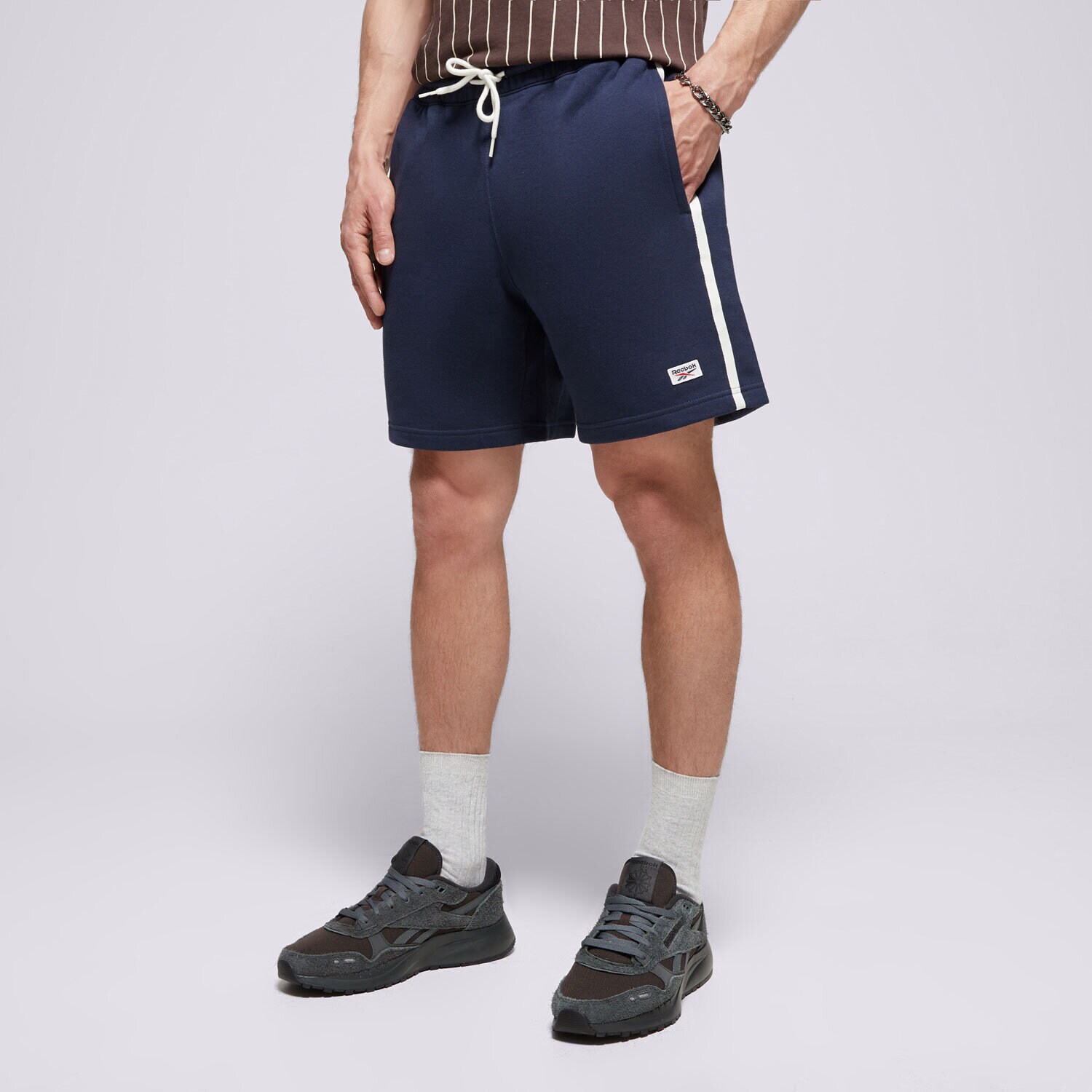 Krótkie spodenki, szorty męskie REEBOK SZORTY COURT SPORT SHORT 100075660 GRANATOWY