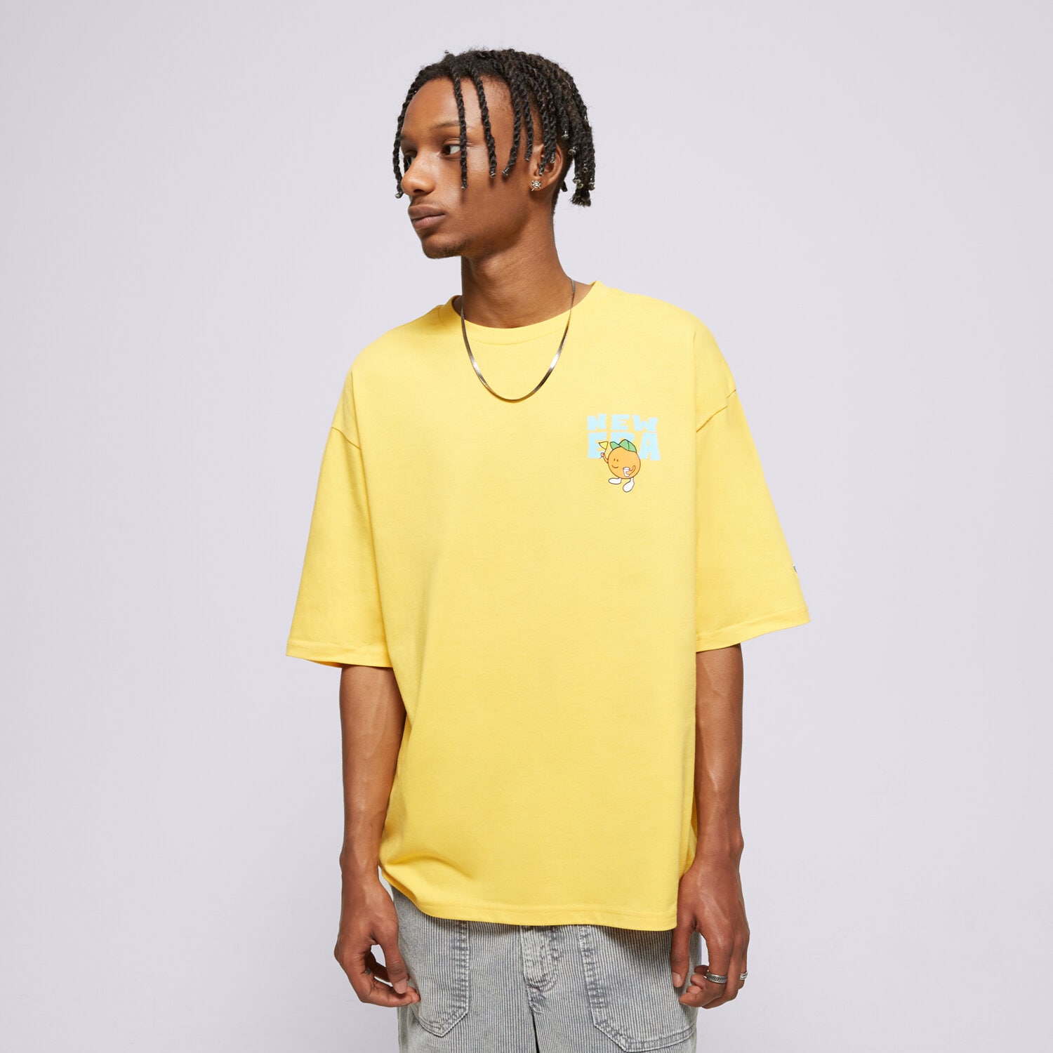 Koszulka, t-shirt sportowy męski NEW ERA T-SHIRT NE FRUIT GRPHC OS NONE 60502630 ŻÓŁTY