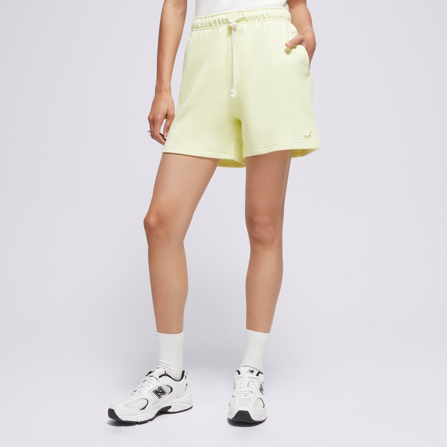 Krótkie spodenki, szorty damskie NEW BALANCE SZORTY ATHLETICS FRENCH TERRY WS41508LLT ŻÓŁTY