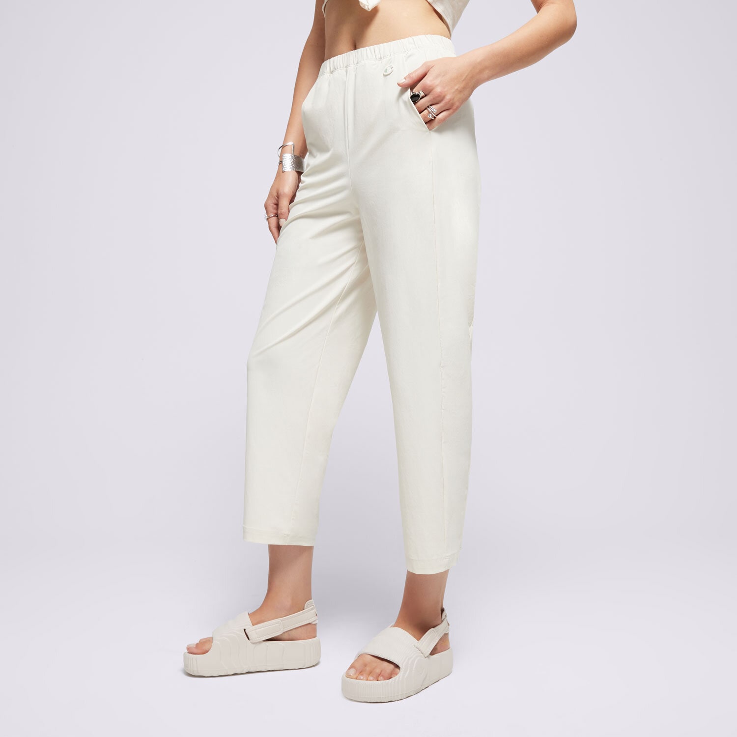 Spodnie sportowe damskie CHAMPION SPODNIE WIDE LEG ECO FUTURE 117110YS137 BEŻOWY