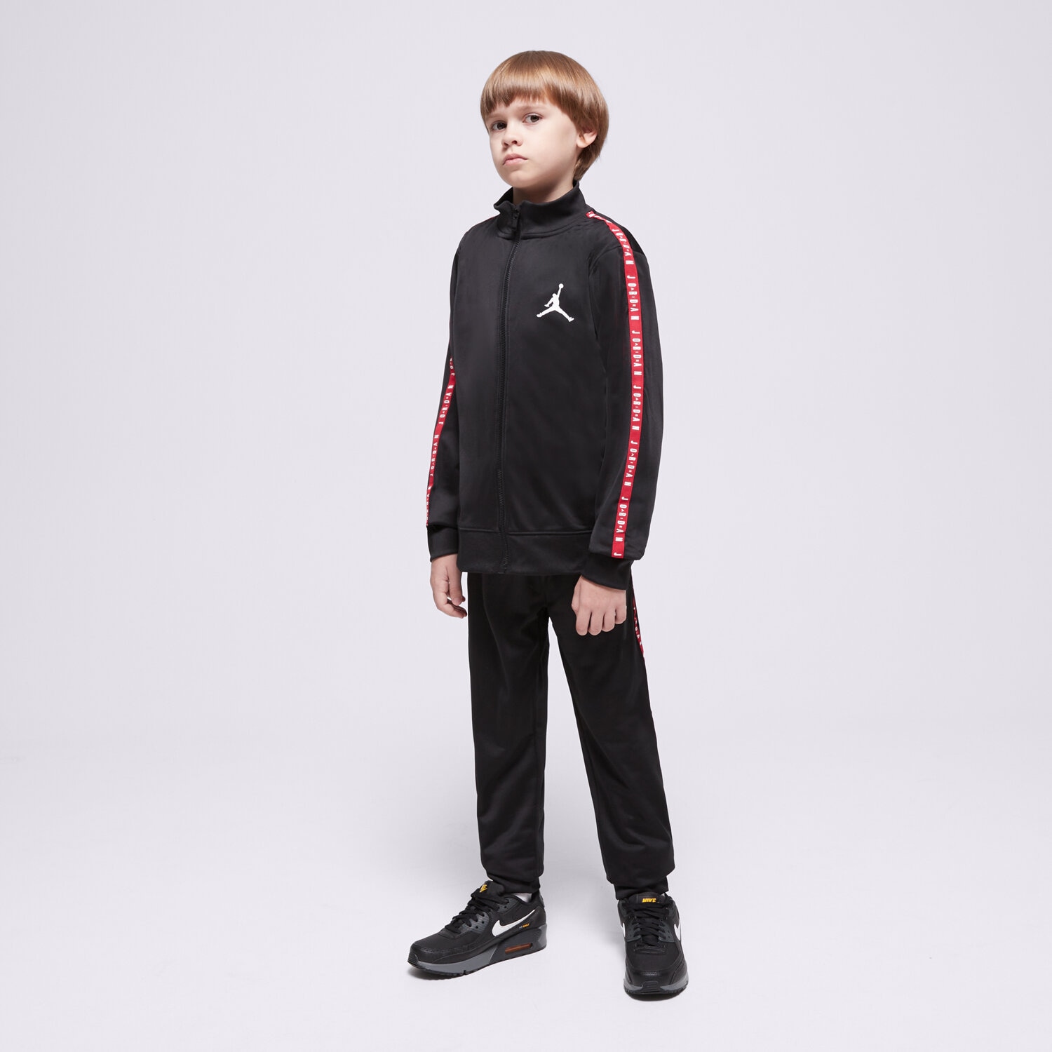 Sportowe spodnie dziecięce JORDAN DRES JDN AIR JORDAN TRICOT SET BOY 95A449-023 CZARNY