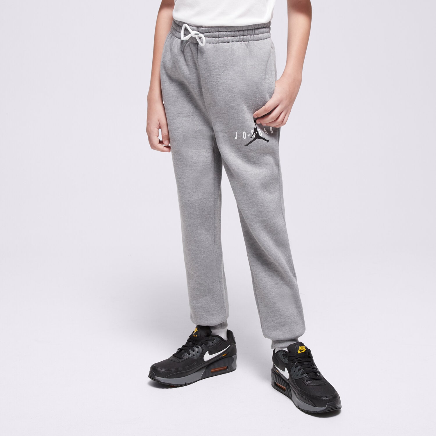 Sportowe spodnie dziecięce JORDAN SPODNIE JDB JUMPMAN SUSTAINABLE PANT BOY 95B912-GEH SZARY