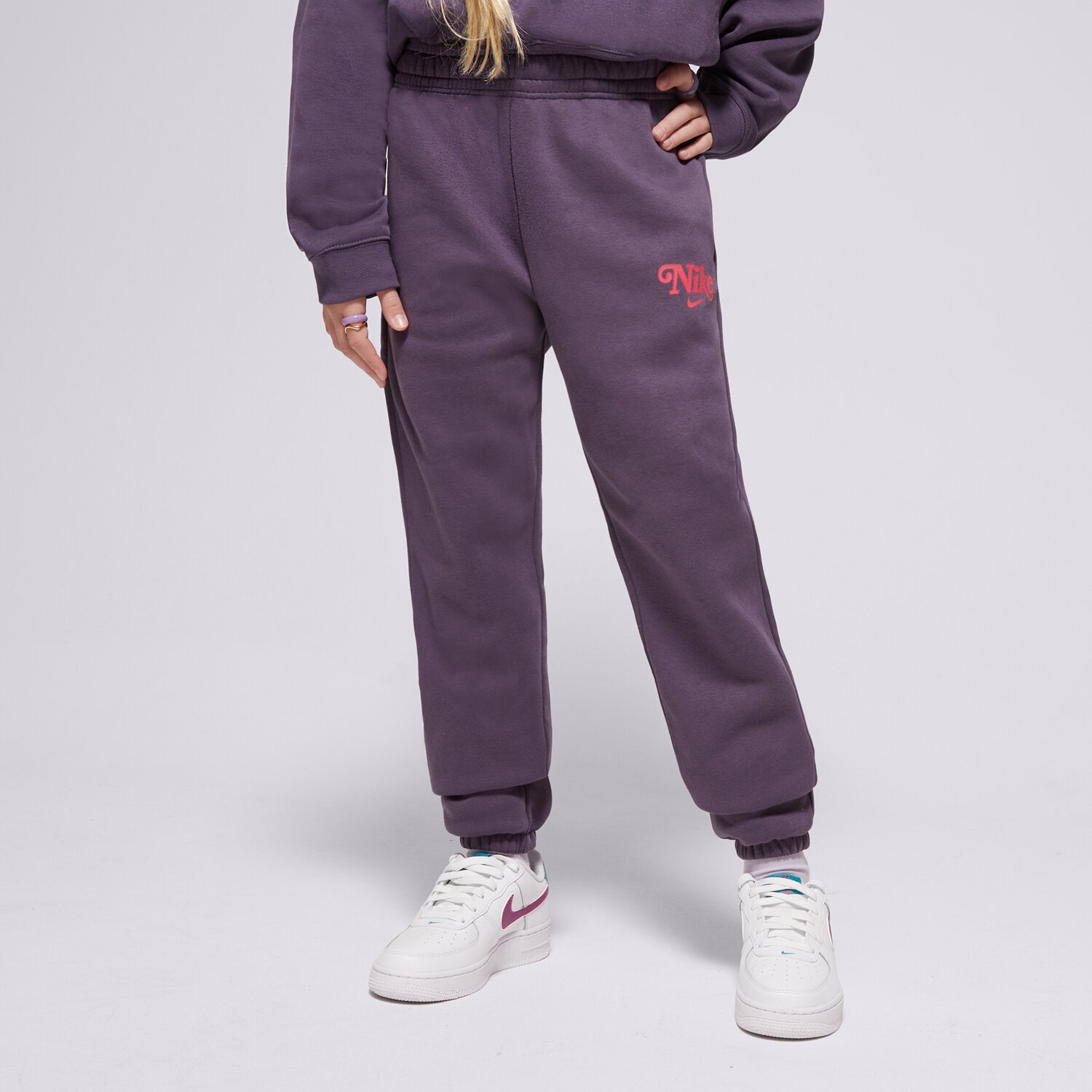 Sportowe spodnie dziecięce NIKE SPODNIE G NSW TREND FLC CF PANT GIRL