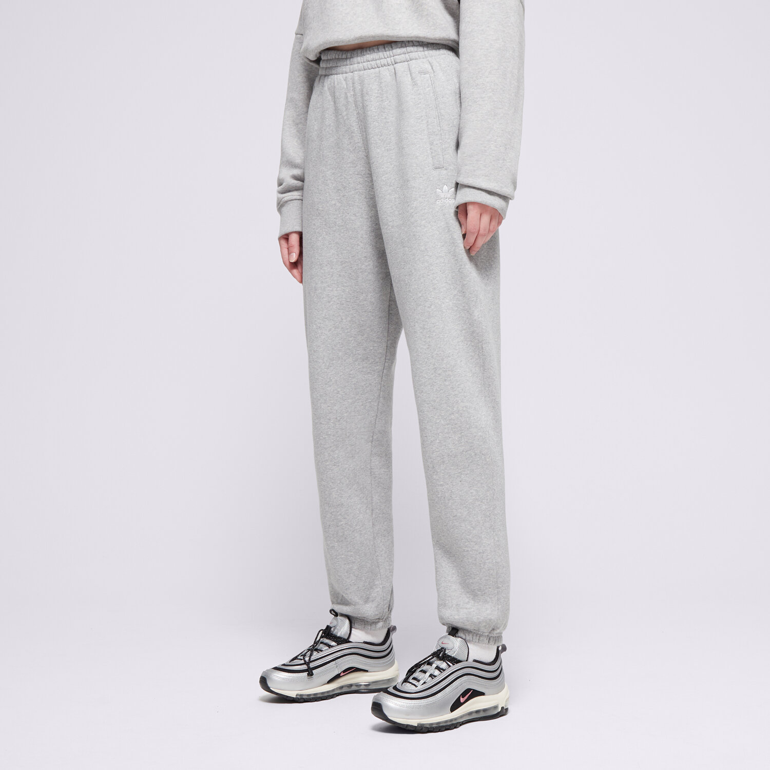 Spodnie sportowe damskie ADIDAS SPODNIE ESS JOGGERS IY9638 SZARY